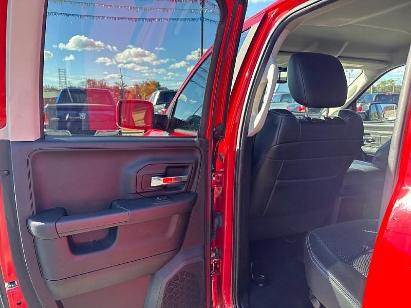 2015 RED /BLACK RAM 1500 Sport Quad Cab 4WD (1C6RR7HT0FS) with an 5.7L V8 OHV 16V engine, 6-Speed Automatic transmission, located at 3304 Woodville Road, Northwood, OH, 43619, (419) 210-8019, 41.612694, -83.480743 - Your #1 Destination for Auto Loans and mdash;No Matter Your Credit!At our dealership, we believe everyone deserves the opportunity to drive their dream car and mdash;whether you have good credit, bad credit, or no credit at all. With a wide selection of hundreds of cars, trucks, and SUVs, you'll fin - Photo#10