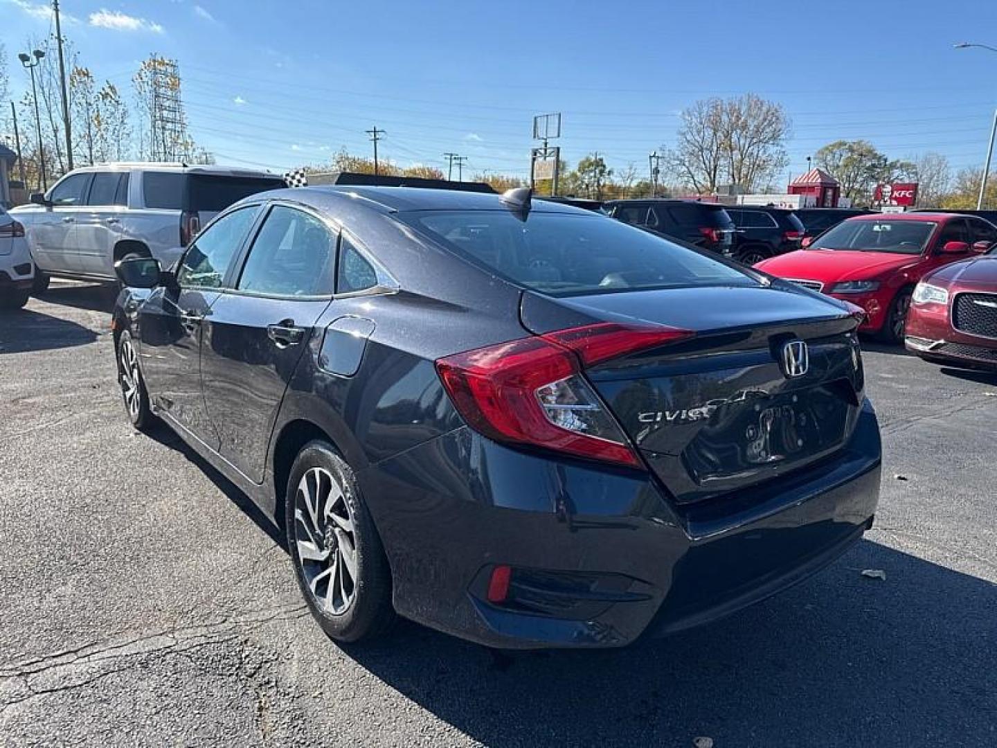 2018 GRAY /BLACK Honda Civic EX Sedan CVT (2HGFC2F71JH) with an 2.0L L4 DOHC 16V engine, CVT transmission, located at 3304 Woodville Road, Northwood, OH, 43619, (419) 210-8019, 41.612694, -83.480743 - Photo#2