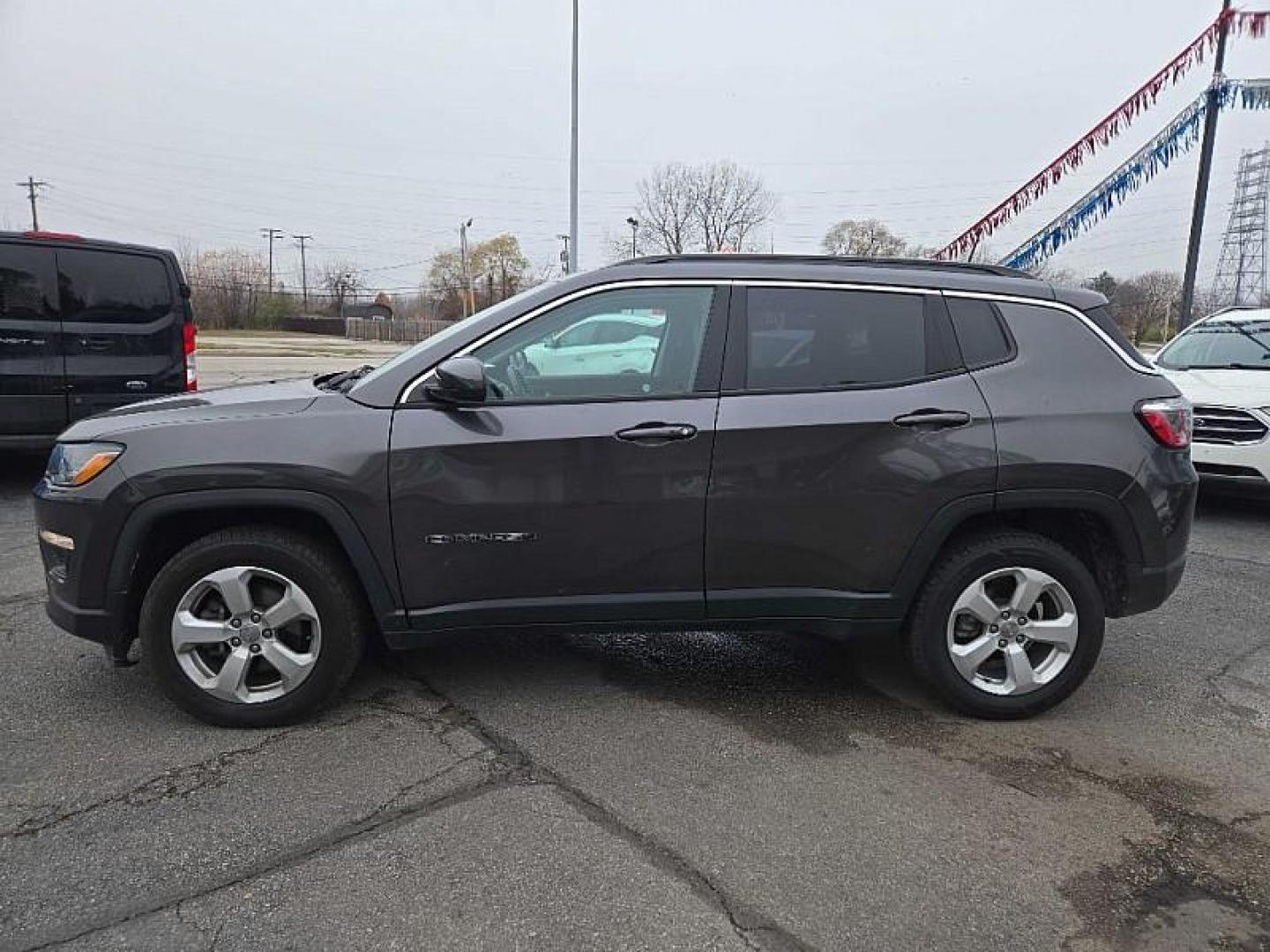 2020 GRAY /BLACK Jeep Compass Latitude 4WD (3C4NJDBB9LT) with an 2.4L L4 DOHC 16V engine, Automatic 9-Spd transmission, located at 3304 Woodville Road, Northwood, OH, 43619, (419) 210-8019, 41.612694, -83.480743 - Your #1 Destination for Auto Loans and mdash;No Matter Your Credit!At our dealership, we believe everyone deserves the opportunity to drive their dream car and mdash;whether you have good credit, bad credit, or no credit at all. With a wide selection of hundreds of cars, trucks, and SUVs, you'll fin - Photo#1