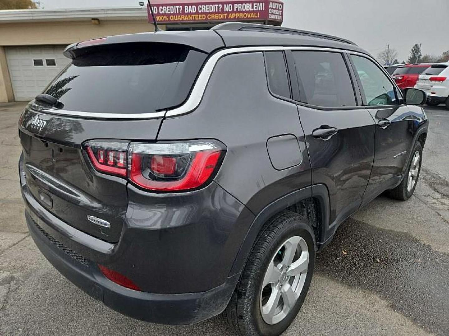 2020 GRAY /BLACK Jeep Compass Latitude 4WD (3C4NJDBB9LT) with an 2.4L L4 DOHC 16V engine, Automatic 9-Spd transmission, located at 3304 Woodville Road, Northwood, OH, 43619, (419) 210-8019, 41.612694, -83.480743 - Your #1 Destination for Auto Loans and mdash;No Matter Your Credit!At our dealership, we believe everyone deserves the opportunity to drive their dream car and mdash;whether you have good credit, bad credit, or no credit at all. With a wide selection of hundreds of cars, trucks, and SUVs, you'll fin - Photo#2