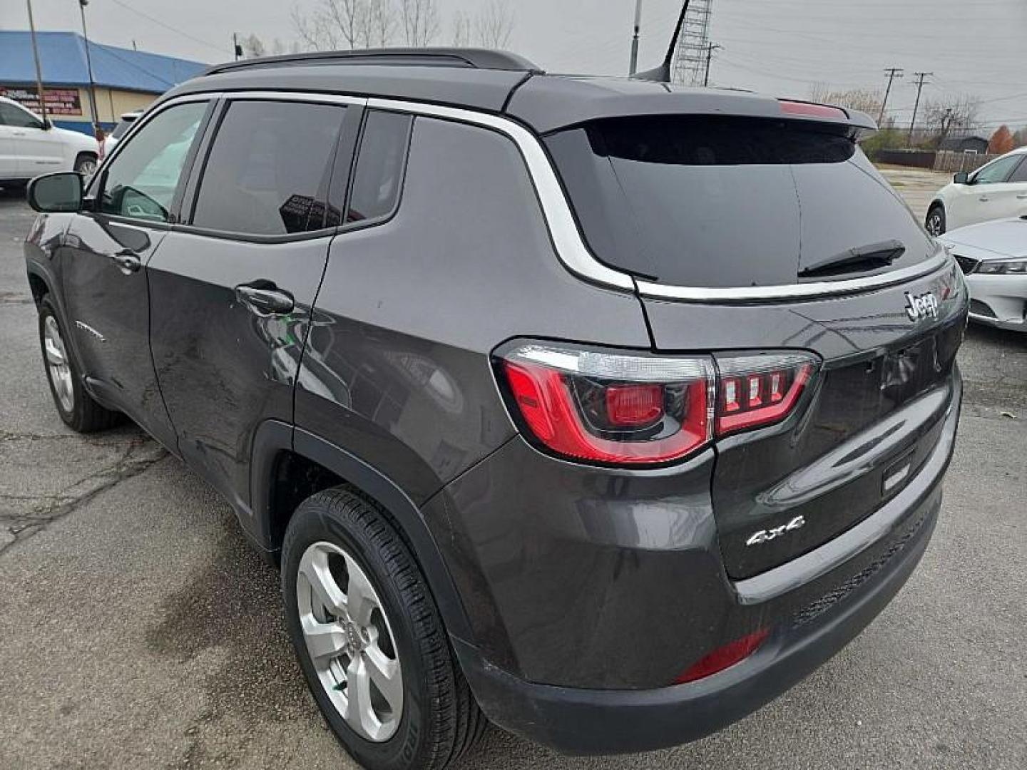 2020 GRAY /BLACK Jeep Compass Latitude 4WD (3C4NJDBB9LT) with an 2.4L L4 DOHC 16V engine, Automatic 9-Spd transmission, located at 3304 Woodville Road, Northwood, OH, 43619, (419) 210-8019, 41.612694, -83.480743 - Your #1 Destination for Auto Loans and mdash;No Matter Your Credit!At our dealership, we believe everyone deserves the opportunity to drive their dream car and mdash;whether you have good credit, bad credit, or no credit at all. With a wide selection of hundreds of cars, trucks, and SUVs, you'll fin - Photo#4