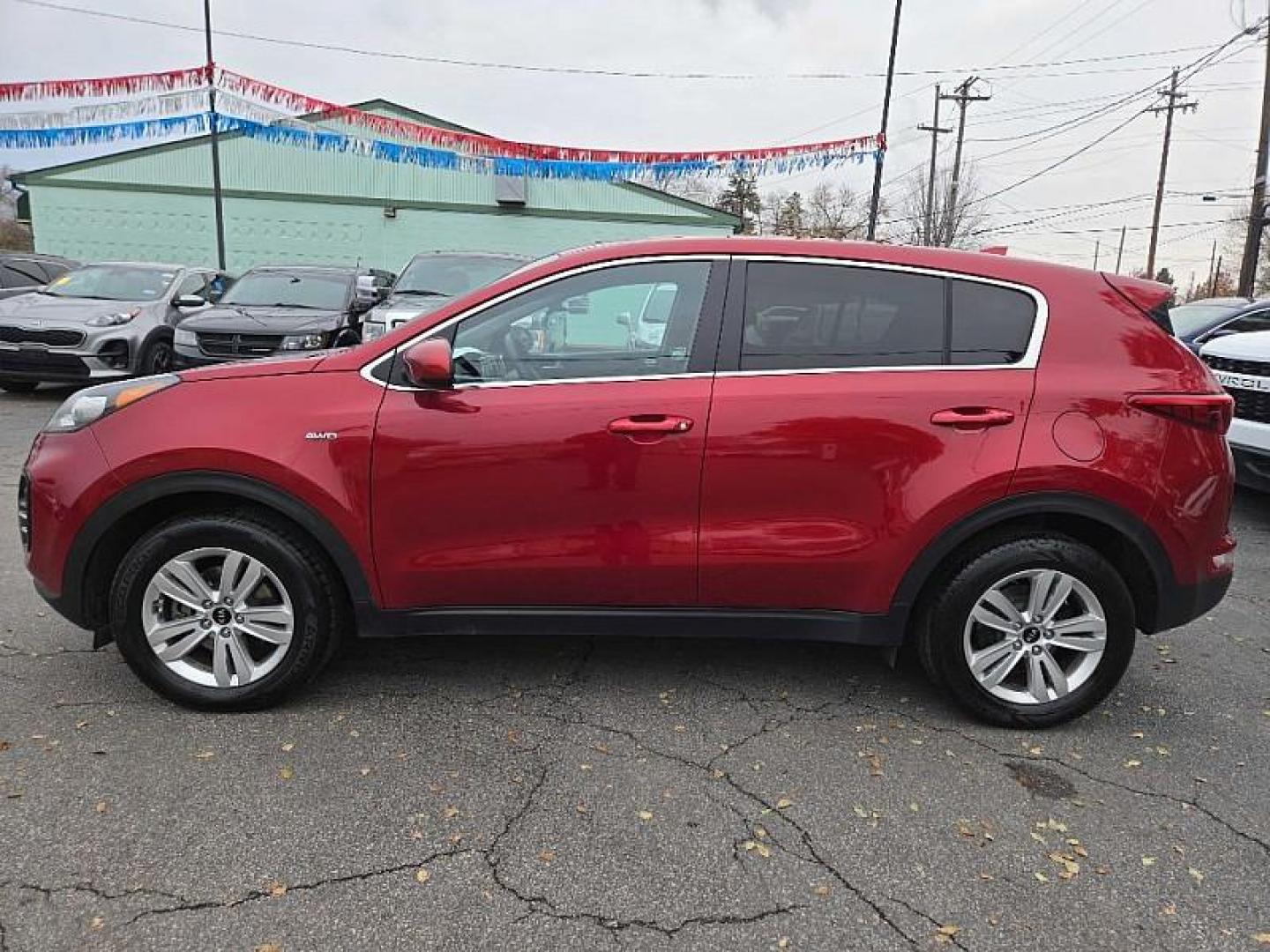 2019 RED /BLACK Kia Sportage LX AWD (KNDPMCAC8K7) with an 2.4L V6 DOHC 24V engine, 6A transmission, located at 3304 Woodville Road, Northwood, OH, 43619, (419) 210-8019, 41.612694, -83.480743 - Your #1 Destination for Auto Loans and mdash;No Matter Your Credit!At our dealership, we believe everyone deserves the opportunity to drive their dream car and mdash;whether you have good credit, bad credit, or no credit at all. With a wide selection of hundreds of cars, trucks, and SUVs, you'll fin - Photo#3