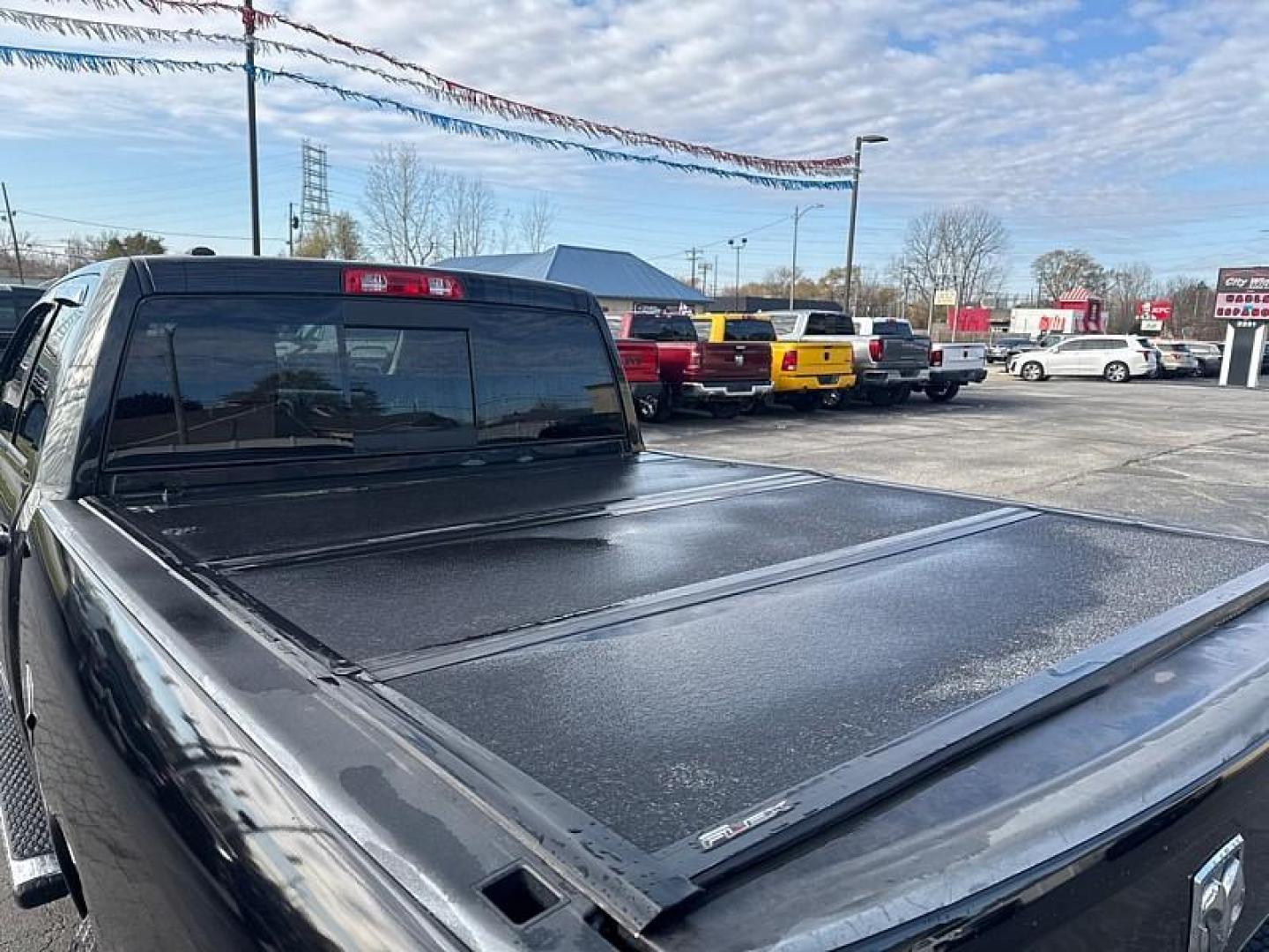 2016 BLACK /BLACK RAM 1500 SLT Quad Cab 2WD (1C6RR6GT0GS) with an 5.7L V8 OHV 16V engine, 6A transmission, located at 3304 Woodville Road, Northwood, OH, 43619, (419) 210-8019, 41.612694, -83.480743 - Your #1 Destination for Auto Loans and mdash;No Matter Your Credit!At our dealership, we believe everyone deserves the opportunity to drive their dream car and mdash;whether you have good credit, bad credit, or no credit at all. With a wide selection of hundreds of cars, trucks, and SUVs, you'll fin - Photo#12