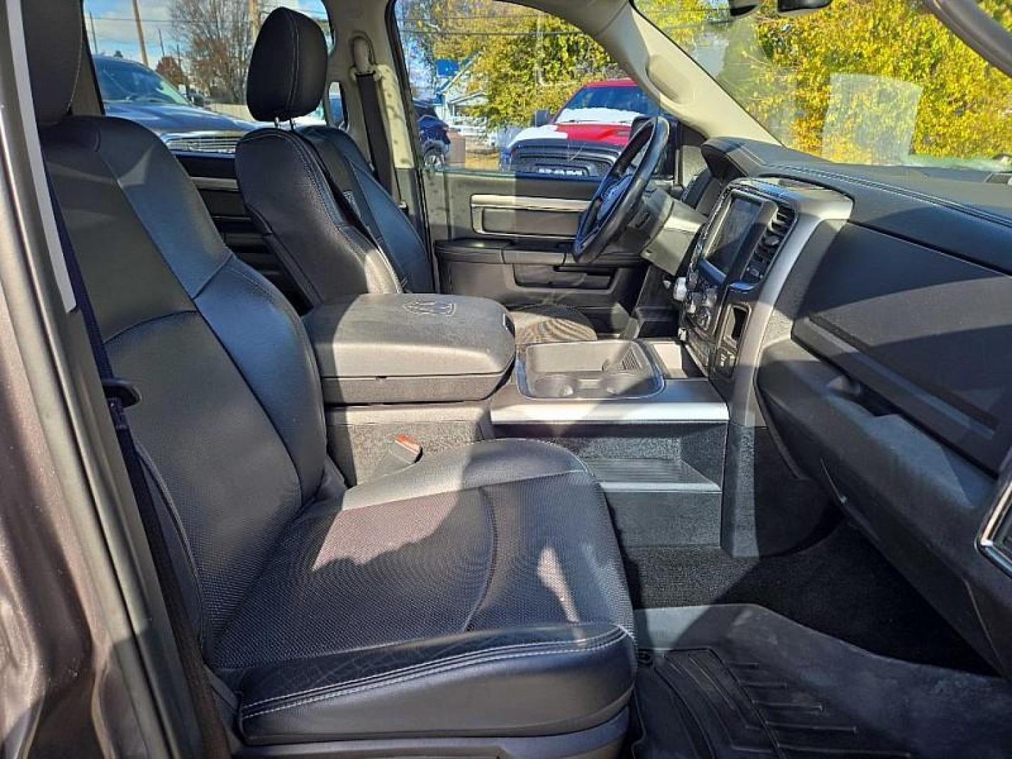 2015 GRAY /BLACK RAM 1500 Sport Crew Cab SWB 4WD (1C6RR7MT3FS) with an 5.7L V8 OHV 16V engine, 6-Speed Automatic transmission, located at 3304 Woodville Road, Northwood, OH, 43619, (419) 210-8019, 41.612694, -83.480743 - Your #1 Destination for Auto Loans and mdash;No Matter Your Credit!At our dealership, we believe everyone deserves the opportunity to drive their dream car and mdash;whether you have good credit, bad credit, or no credit at all. With a wide selection of hundreds of cars, trucks, and SUVs, you'll fin - Photo#16