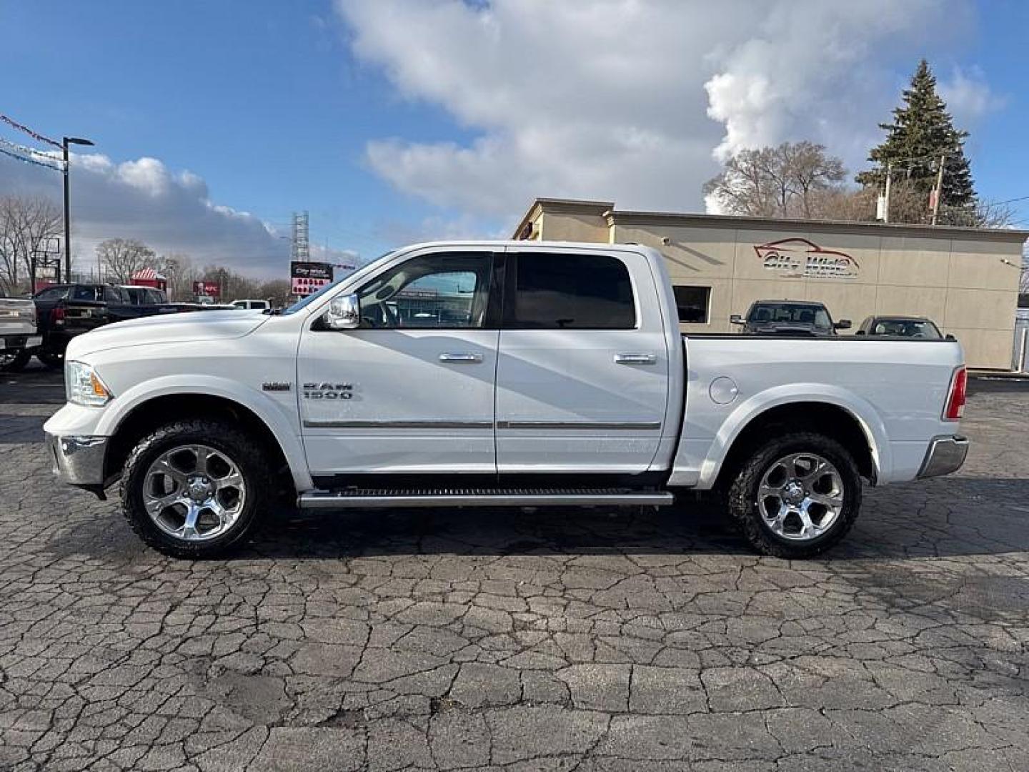 2014 WHITE /TAN/BROWN RAM 1500 Laramie Crew Cab SWB 4WD (1C6RR7NT7ES) with an 5.7L V8 OHV 16V engine, 6-Speed Automatic transmission, located at 3304 Woodville Road, Northwood, OH, 43619, (419) 210-8019, 41.612694, -83.480743 - Your #1 Destination for Auto Loans and mdash;No Matter Your Credit!At our dealership, we believe everyone deserves the opportunity to drive their dream car and mdash;whether you have good credit, bad credit, or no credit at all. With a wide selection of hundreds of cars, trucks, and SUVs, you'll fin - Photo#1
