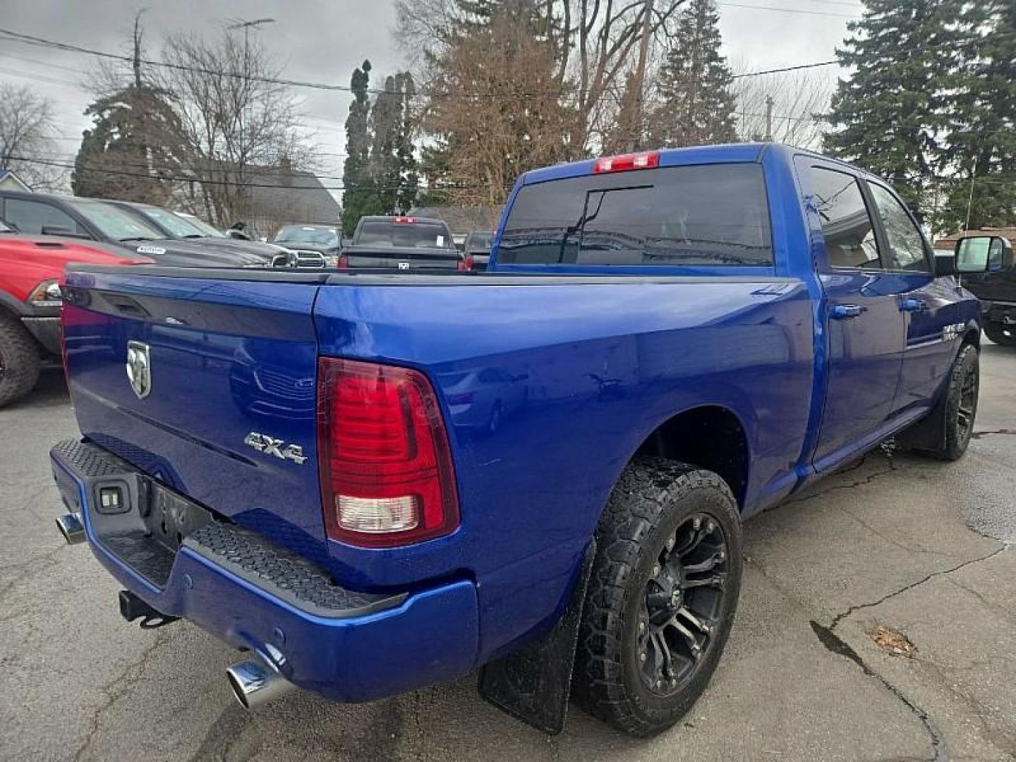 2016 BLUE /BLACK RAM 1500 Sport Crew Cab LWB 4WD (1C6RR7UT8GS) with an 5.7L V8 OHV 16V engine, 6A transmission, located at 3304 Woodville Road, Northwood, OH, 43619, (419) 210-8019, 41.612694, -83.480743 - Your #1 Destination for Auto Loans and mdash;No Matter Your Credit!At our dealership, we believe everyone deserves the opportunity to drive their dream car and mdash;whether you have good credit, bad credit, or no credit at all. With a wide selection of hundreds of cars, trucks, and SUVs, you'll fin - Photo#0