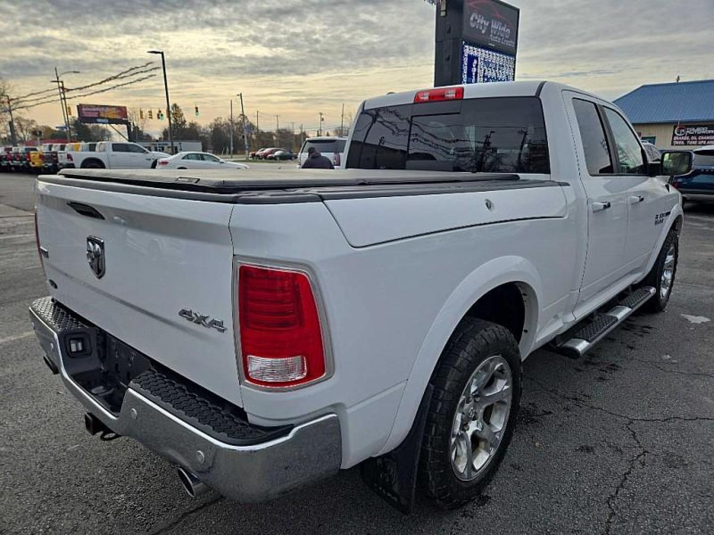 2017 WHITE /BLACK RAM 1500 Laramie Quad Cab 4WD (1C6RR7JM7HS) with an 3.0L V6 DIESEL engine, 8A transmission, located at 3304 Woodville Road, Northwood, OH, 43619, (419) 210-8019, 41.612694, -83.480743 - Your #1 Destination for Auto Loans and mdash;No Matter Your Credit!At our dealership, we believe everyone deserves the opportunity to drive their dream car and mdash;whether you have good credit, bad credit, or no credit at all. With a wide selection of hundreds of cars, trucks, and SUVs, you'll fin - Photo#1