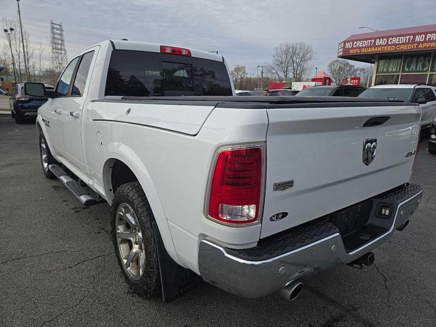 2017 WHITE /BLACK RAM 1500 Laramie Quad Cab 4WD (1C6RR7JM7HS) with an 3.0L V6 DIESEL engine, 8A transmission, located at 3304 Woodville Road, Northwood, OH, 43619, (419) 210-8019, 41.612694, -83.480743 - Your #1 Destination for Auto Loans and mdash;No Matter Your Credit!At our dealership, we believe everyone deserves the opportunity to drive their dream car and mdash;whether you have good credit, bad credit, or no credit at all. With a wide selection of hundreds of cars, trucks, and SUVs, you'll fin - Photo#2