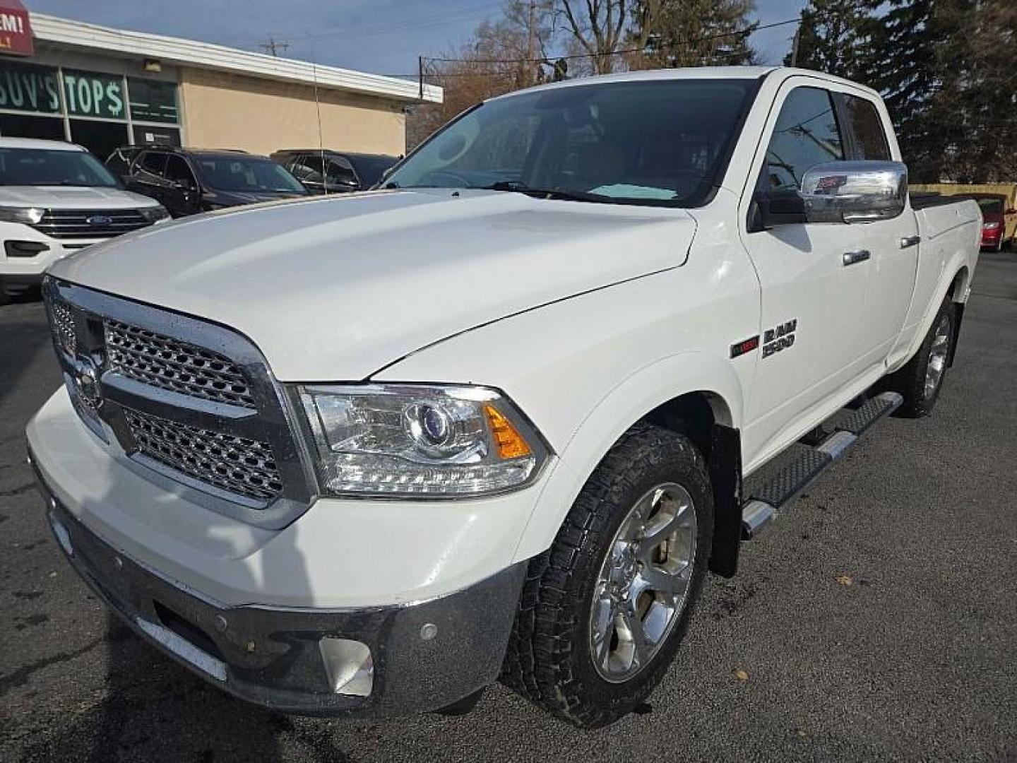 2017 WHITE /BLACK RAM 1500 Laramie Quad Cab 4WD (1C6RR7JM7HS) with an 3.0L V6 DIESEL engine, 8A transmission, located at 3304 Woodville Road, Northwood, OH, 43619, (419) 210-8019, 41.612694, -83.480743 - Your #1 Destination for Auto Loans and mdash;No Matter Your Credit!At our dealership, we believe everyone deserves the opportunity to drive their dream car and mdash;whether you have good credit, bad credit, or no credit at all. With a wide selection of hundreds of cars, trucks, and SUVs, you'll fin - Photo#3