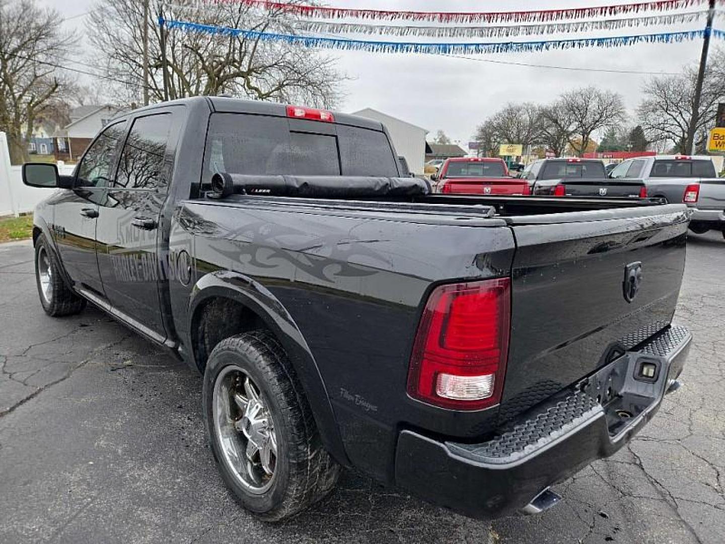 2016 BLACK /BLACK RAM 1500 Sport Crew Cab SWB 2WD (1C6RR6MT1GS) with an 5.7L V8 OHV 16V engine, 6A transmission, located at 3304 Woodville Road, Northwood, OH, 43619, (419) 210-8019, 41.612694, -83.480743 - Your #1 Destination for Auto Loans and mdash;No Matter Your Credit!At our dealership, we believe everyone deserves the opportunity to drive their dream car and mdash;whether you have good credit, bad credit, or no credit at all. With a wide selection of hundreds of cars, trucks, and SUVs, you'll fin - Photo#2