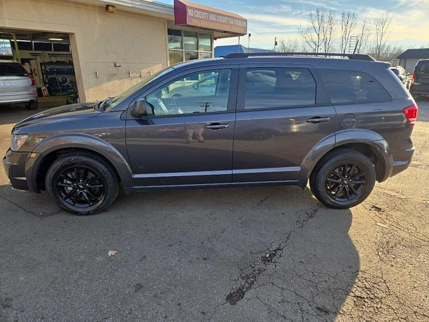 2020 GRAY /BLACK Dodge Journey SE Value (3C4PDCAB0LT) with an 2.4L L4 DOHC 16V engine, 6A transmission, located at 3304 Woodville Road, Northwood, OH, 43619, (419) 210-8019, 41.612694, -83.480743 - Your #1 Destination for Auto Loans and mdash;No Matter Your Credit!At our dealership, we believe everyone deserves the opportunity to drive their dream car and mdash;whether you have good credit, bad credit, or no credit at all. With a wide selection of hundreds of cars, trucks, and SUVs, you'll fin - Photo#0