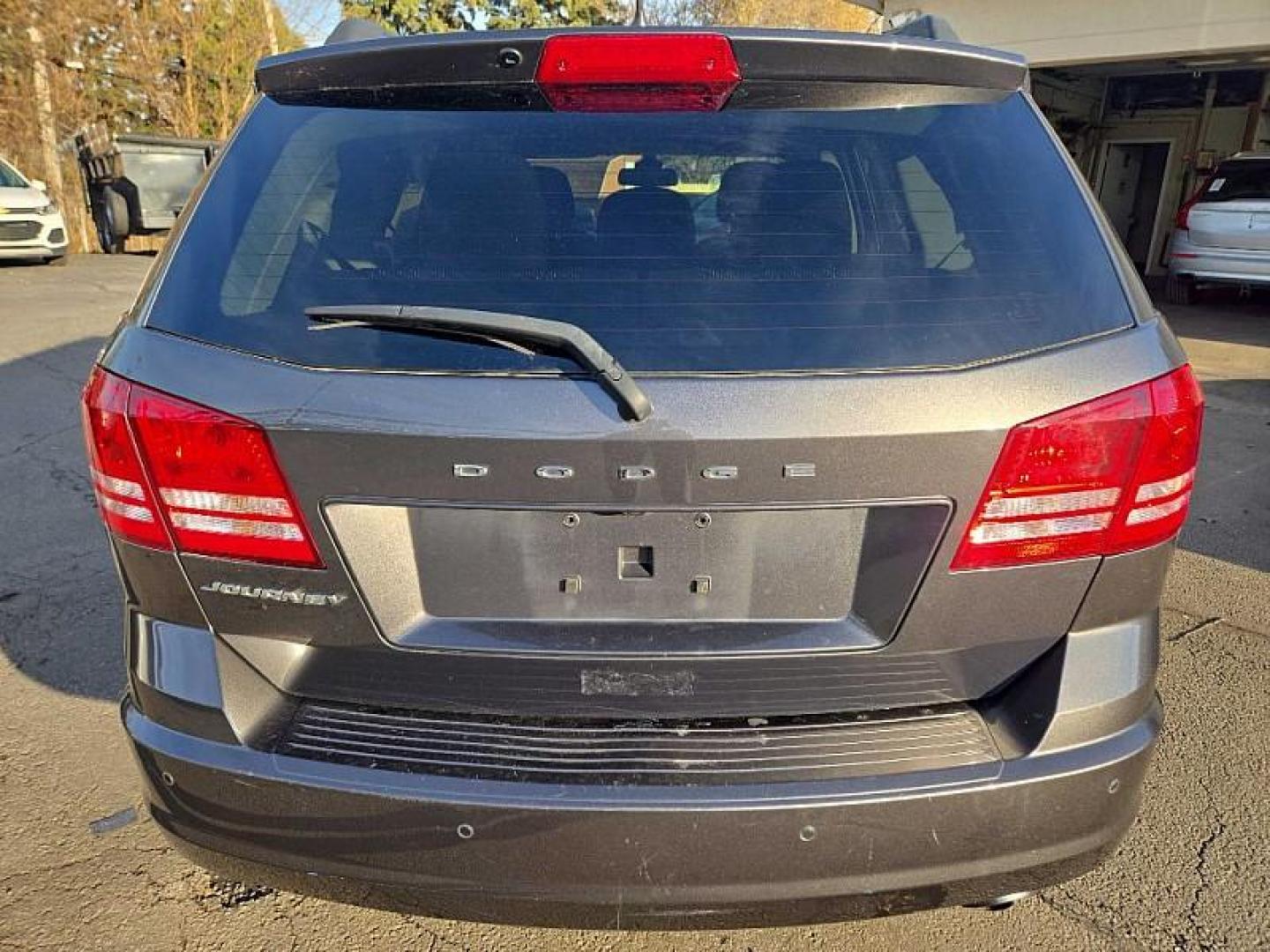 2020 GRAY /BLACK Dodge Journey SE Value (3C4PDCAB0LT) with an 2.4L L4 DOHC 16V engine, 6A transmission, located at 3304 Woodville Road, Northwood, OH, 43619, (419) 210-8019, 41.612694, -83.480743 - Your #1 Destination for Auto Loans and mdash;No Matter Your Credit!At our dealership, we believe everyone deserves the opportunity to drive their dream car and mdash;whether you have good credit, bad credit, or no credit at all. With a wide selection of hundreds of cars, trucks, and SUVs, you'll fin - Photo#2