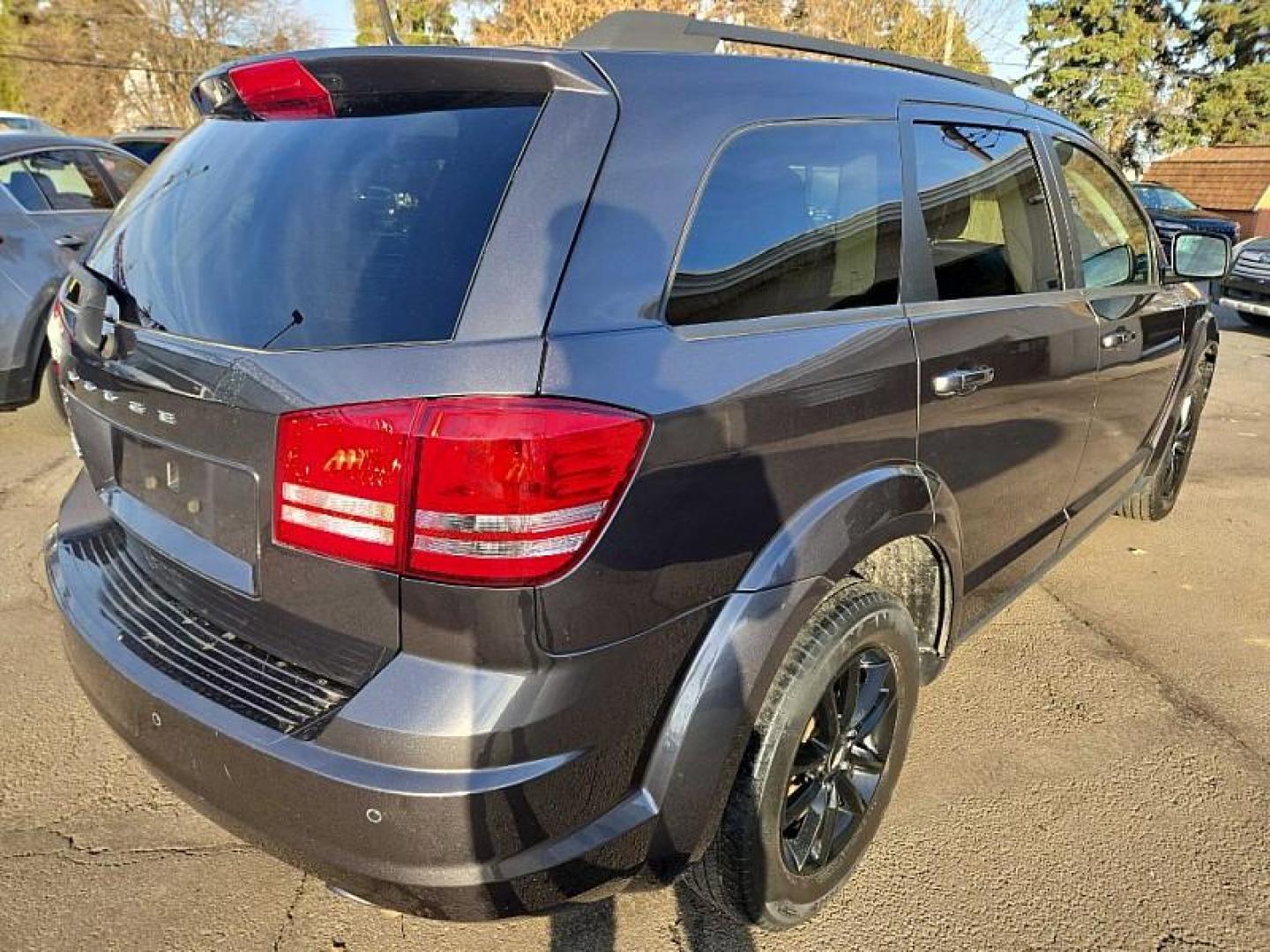2020 GRAY /BLACK Dodge Journey SE Value (3C4PDCAB0LT) with an 2.4L L4 DOHC 16V engine, 6A transmission, located at 3304 Woodville Road, Northwood, OH, 43619, (419) 210-8019, 41.612694, -83.480743 - Your #1 Destination for Auto Loans and mdash;No Matter Your Credit!At our dealership, we believe everyone deserves the opportunity to drive their dream car and mdash;whether you have good credit, bad credit, or no credit at all. With a wide selection of hundreds of cars, trucks, and SUVs, you'll fin - Photo#3