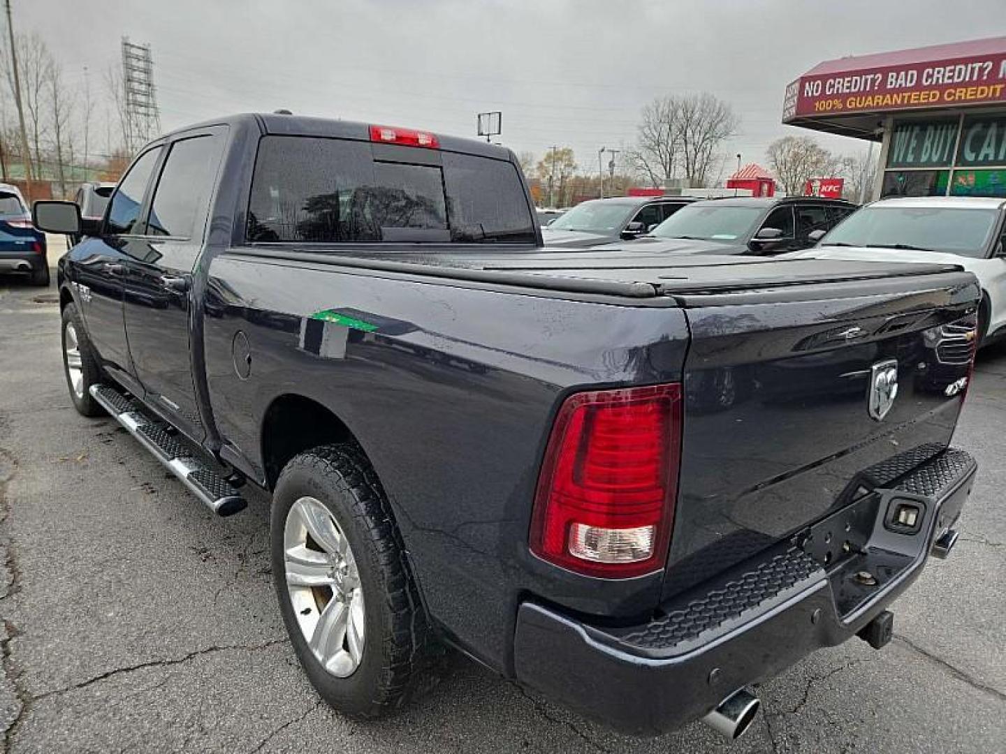 2015 GRAY /BLACK RAM 1500 Sport Crew Cab LWB 4WD (1C6RR7UT6FS) with an 5.7L V8 OHV 16V engine, 6-Speed Automatic transmission, located at 3304 Woodville Road, Northwood, OH, 43619, (419) 210-8019, 41.612694, -83.480743 - Photo#3