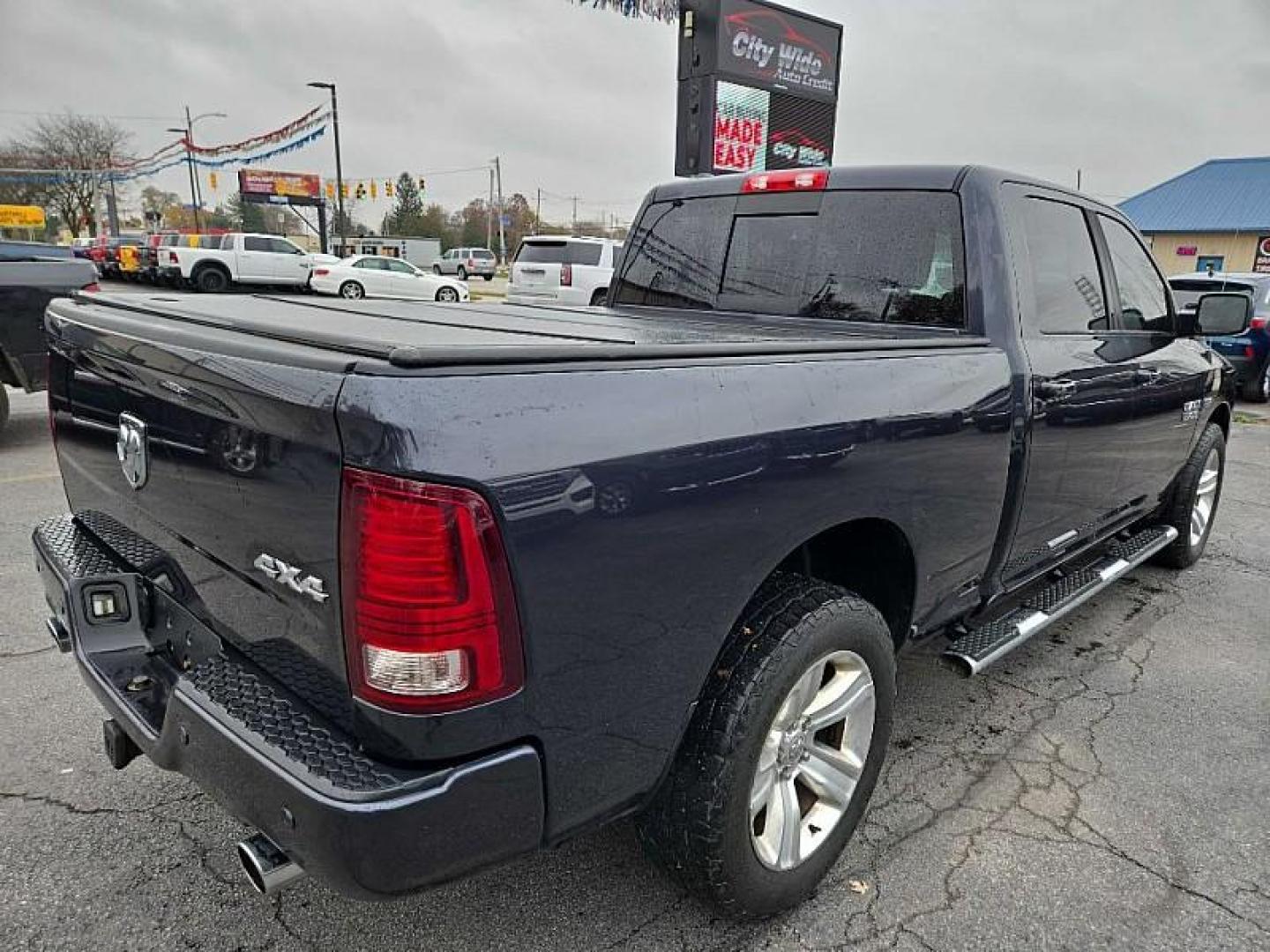 2015 GRAY /BLACK RAM 1500 Sport Crew Cab LWB 4WD (1C6RR7UT6FS) with an 5.7L V8 OHV 16V engine, 6-Speed Automatic transmission, located at 3304 Woodville Road, Northwood, OH, 43619, (419) 210-8019, 41.612694, -83.480743 - Photo#74