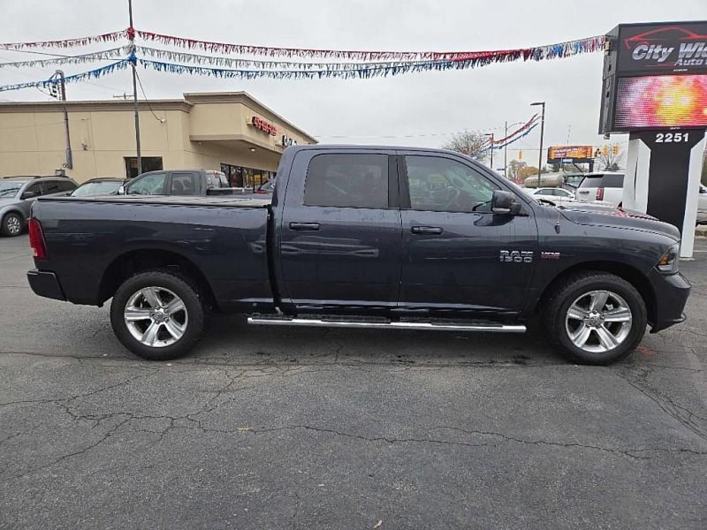 2015 GRAY /BLACK RAM 1500 Sport Crew Cab LWB 4WD (1C6RR7UT6FS) with an 5.7L V8 OHV 16V engine, 6-Speed Automatic transmission, located at 3304 Woodville Road, Northwood, OH, 43619, (419) 210-8019, 41.612694, -83.480743 - Photo#78