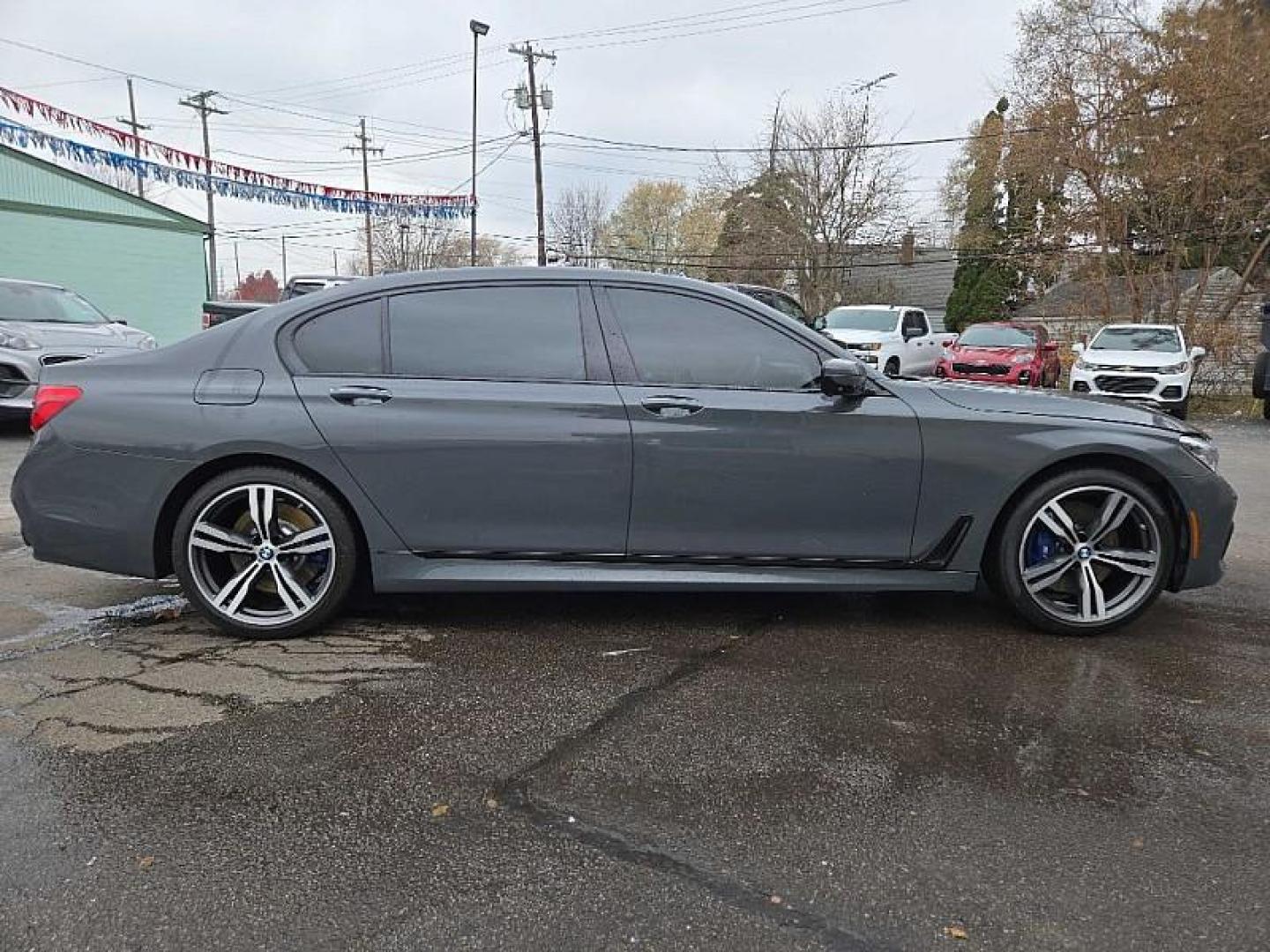 2018 GRAY BMW 7-Series 750i xDrive (WBA7F2C52JB) with an 4.4L V8 DOHC 32V engine, 8A transmission, located at 3304 Woodville Road, Northwood, OH, 43619, (419) 210-8019, 41.612694, -83.480743 - Your #1 Destination for Auto Loans and mdash;No Matter Your Credit!At our dealership, we believe everyone deserves the opportunity to drive their dream car and mdash;whether you have good credit, bad credit, or no credit at all. With a wide selection of hundreds of cars, trucks, and SUVs, you'll fin - Photo#4