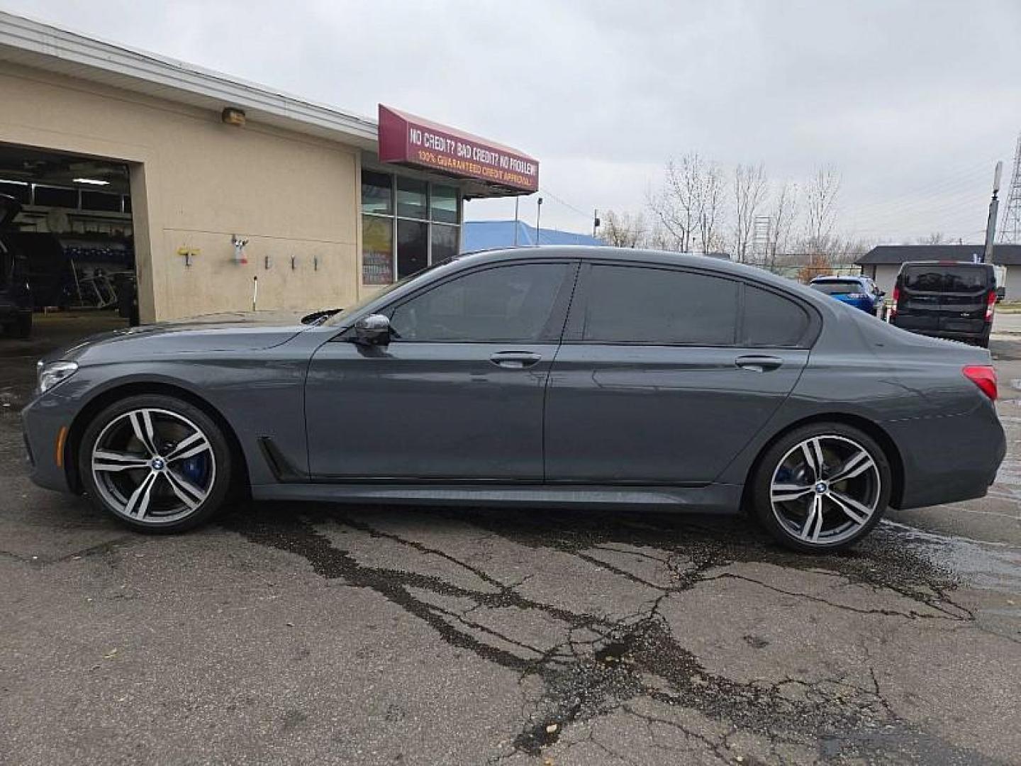 2018 GRAY BMW 7-Series 750i xDrive (WBA7F2C52JB) with an 4.4L V8 DOHC 32V engine, 8A transmission, located at 3304 Woodville Road, Northwood, OH, 43619, (419) 210-8019, 41.612694, -83.480743 - Your #1 Destination for Auto Loans and mdash;No Matter Your Credit!At our dealership, we believe everyone deserves the opportunity to drive their dream car and mdash;whether you have good credit, bad credit, or no credit at all. With a wide selection of hundreds of cars, trucks, and SUVs, you'll fin - Photo#5