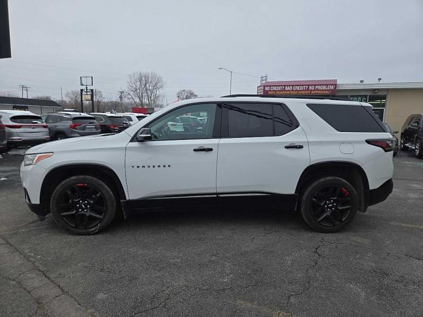 2018 WHITE /BLACK Chevrolet Traverse Premier AWD (1GNEVJKW7JJ) with an 3.6L V6 DOHC 24V engine, 9A transmission, located at 3304 Woodville Road, Northwood, OH, 43619, (419) 210-8019, 41.612694, -83.480743 - Your #1 Destination for Auto Loans and mdash;No Matter Your Credit!At our dealership, we believe everyone deserves the opportunity to drive their dream car and mdash;whether you have good credit, bad credit, or no credit at all. With a wide selection of hundreds of cars, trucks, and SUVs, you'll fin - Photo#3