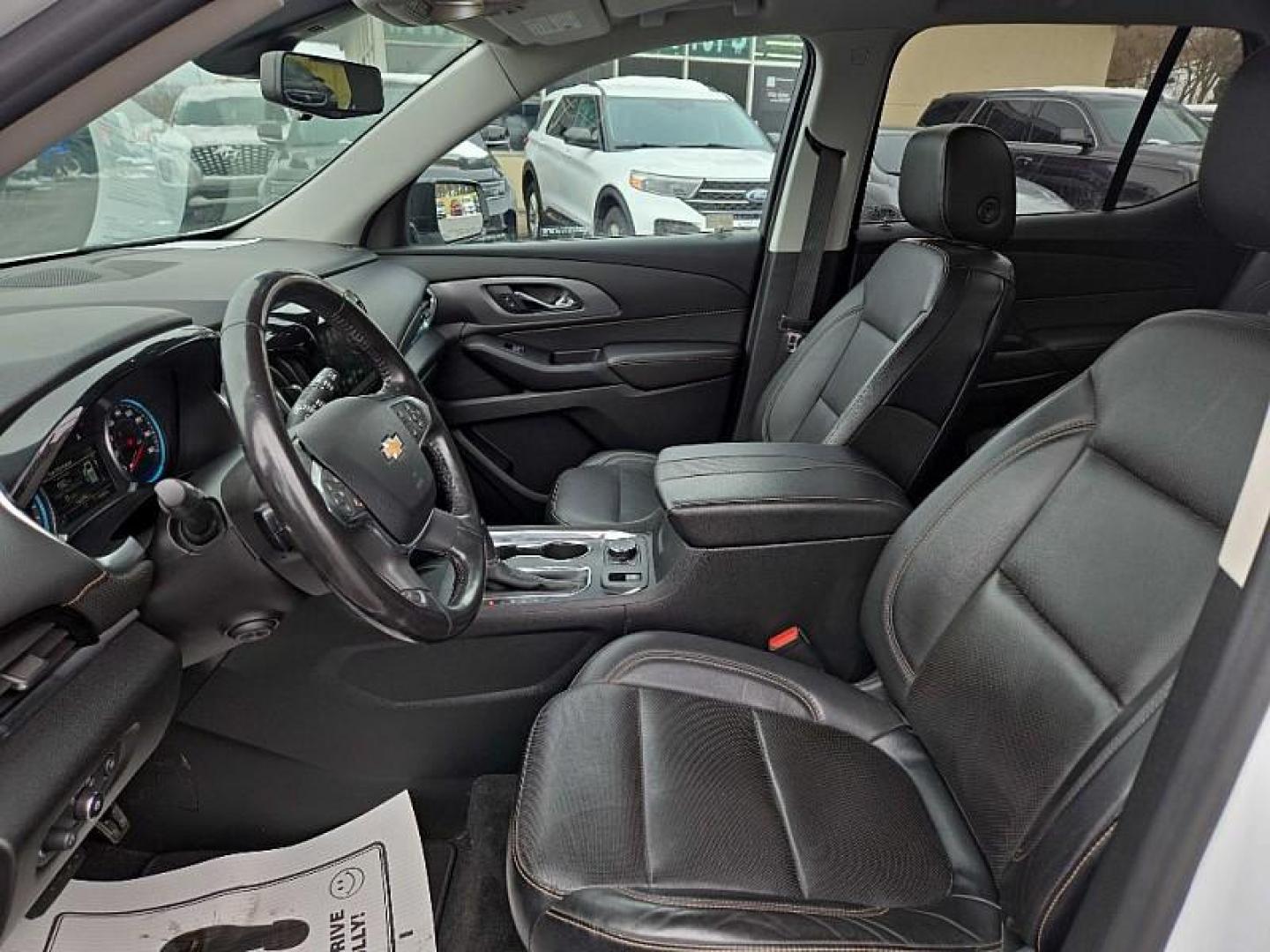 2018 WHITE /BLACK Chevrolet Traverse Premier AWD (1GNEVJKW7JJ) with an 3.6L V6 DOHC 24V engine, 9A transmission, located at 3304 Woodville Road, Northwood, OH, 43619, (419) 210-8019, 41.612694, -83.480743 - Your #1 Destination for Auto Loans and mdash;No Matter Your Credit!At our dealership, we believe everyone deserves the opportunity to drive their dream car and mdash;whether you have good credit, bad credit, or no credit at all. With a wide selection of hundreds of cars, trucks, and SUVs, you'll fin - Photo#9