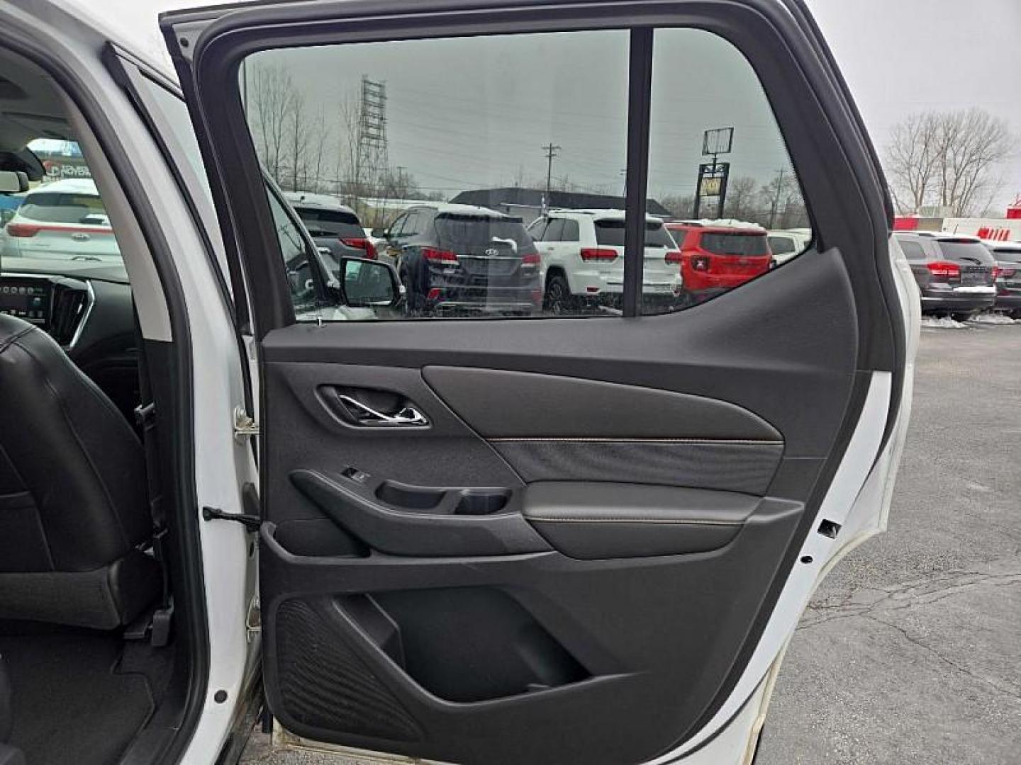 2018 WHITE /BLACK Chevrolet Traverse Premier AWD (1GNEVJKW7JJ) with an 3.6L V6 DOHC 24V engine, 9A transmission, located at 3304 Woodville Road, Northwood, OH, 43619, (419) 210-8019, 41.612694, -83.480743 - Your #1 Destination for Auto Loans and mdash;No Matter Your Credit!At our dealership, we believe everyone deserves the opportunity to drive their dream car and mdash;whether you have good credit, bad credit, or no credit at all. With a wide selection of hundreds of cars, trucks, and SUVs, you'll fin - Photo#14