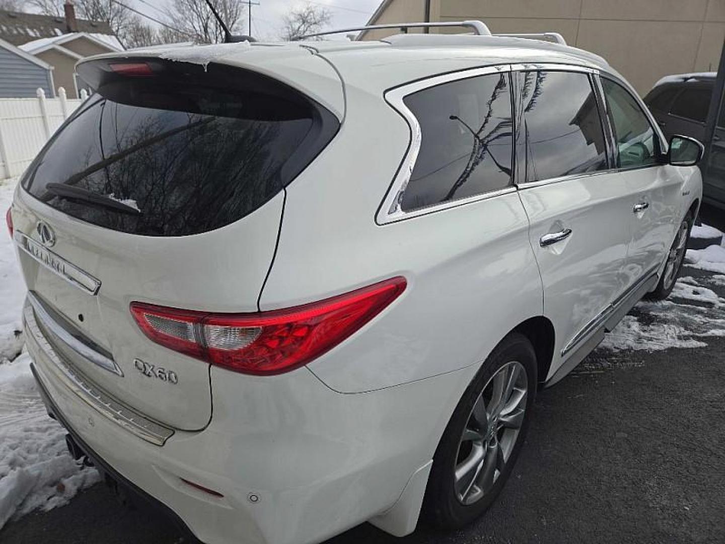 2014 WHITE /TAN Infiniti QX60 Hybrid AWD (5N1CL0MM0EC) with an 2.5L L4 DOHC 16V HYBRID engine, Continuously Variable Transmission transmission, located at 3304 Woodville Road, Northwood, OH, 43619, (419) 210-8019, 41.612694, -83.480743 - Your #1 Destination for Auto Loans and mdash;No Matter Your Credit!At our dealership, we believe everyone deserves the opportunity to drive their dream car and mdash;whether you have good credit, bad credit, or no credit at all. With a wide selection of hundreds of cars, trucks, and SUVs, you'll fin - Photo#2