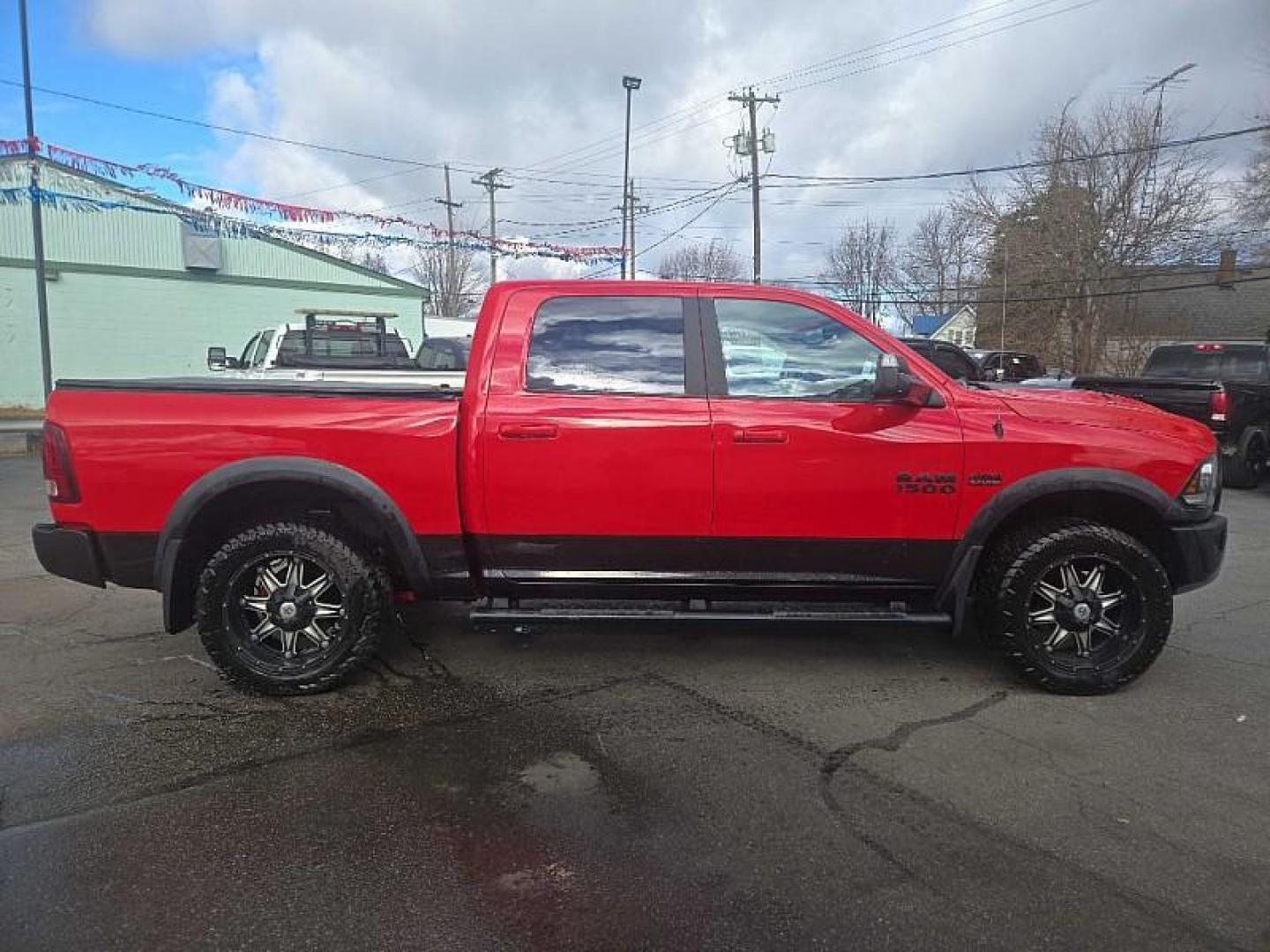2016 RED /BLACK RAM 1500 Rebel Crew Cab SWB 4WD (1C6RR7YT2GS) with an 5.7L V8 OHV 16V engine, 6A transmission, located at 3304 Woodville Road, Northwood, OH, 43619, (419) 210-8019, 41.612694, -83.480743 - Photo#5