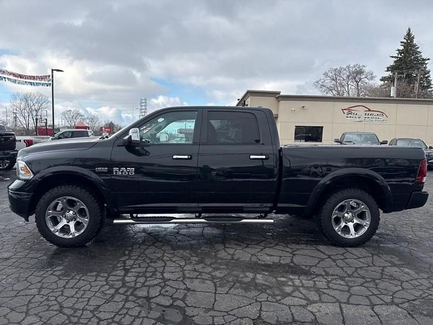 2017 BLACK /BLACK RAM 1500 Laramie Crew Cab LWB 4WD (1C6RR7VT4HS) with an 5.7L V8 OHV 16V engine, 8A transmission, located at 3304 Woodville Road, Northwood, OH, 43619, (419) 210-8019, 41.612694, -83.480743 - Your #1 Destination for Auto Loans and mdash;No Matter Your Credit!At our dealership, we believe everyone deserves the opportunity to drive their dream car and mdash;whether you have good credit, bad credit, or no credit at all. With a wide selection of hundreds of cars, trucks, and SUVs, you'll fin - Photo#1