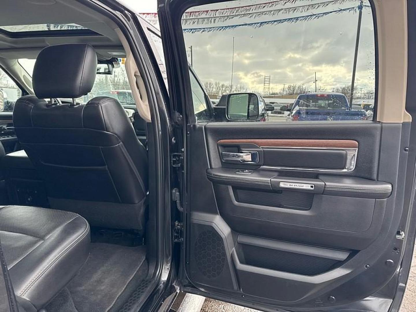 2017 BLACK /BLACK RAM 1500 Laramie Crew Cab LWB 4WD (1C6RR7VT4HS) with an 5.7L V8 OHV 16V engine, 8A transmission, located at 3304 Woodville Road, Northwood, OH, 43619, (419) 210-8019, 41.612694, -83.480743 - Your #1 Destination for Auto Loans and mdash;No Matter Your Credit!At our dealership, we believe everyone deserves the opportunity to drive their dream car and mdash;whether you have good credit, bad credit, or no credit at all. With a wide selection of hundreds of cars, trucks, and SUVs, you'll fin - Photo#12