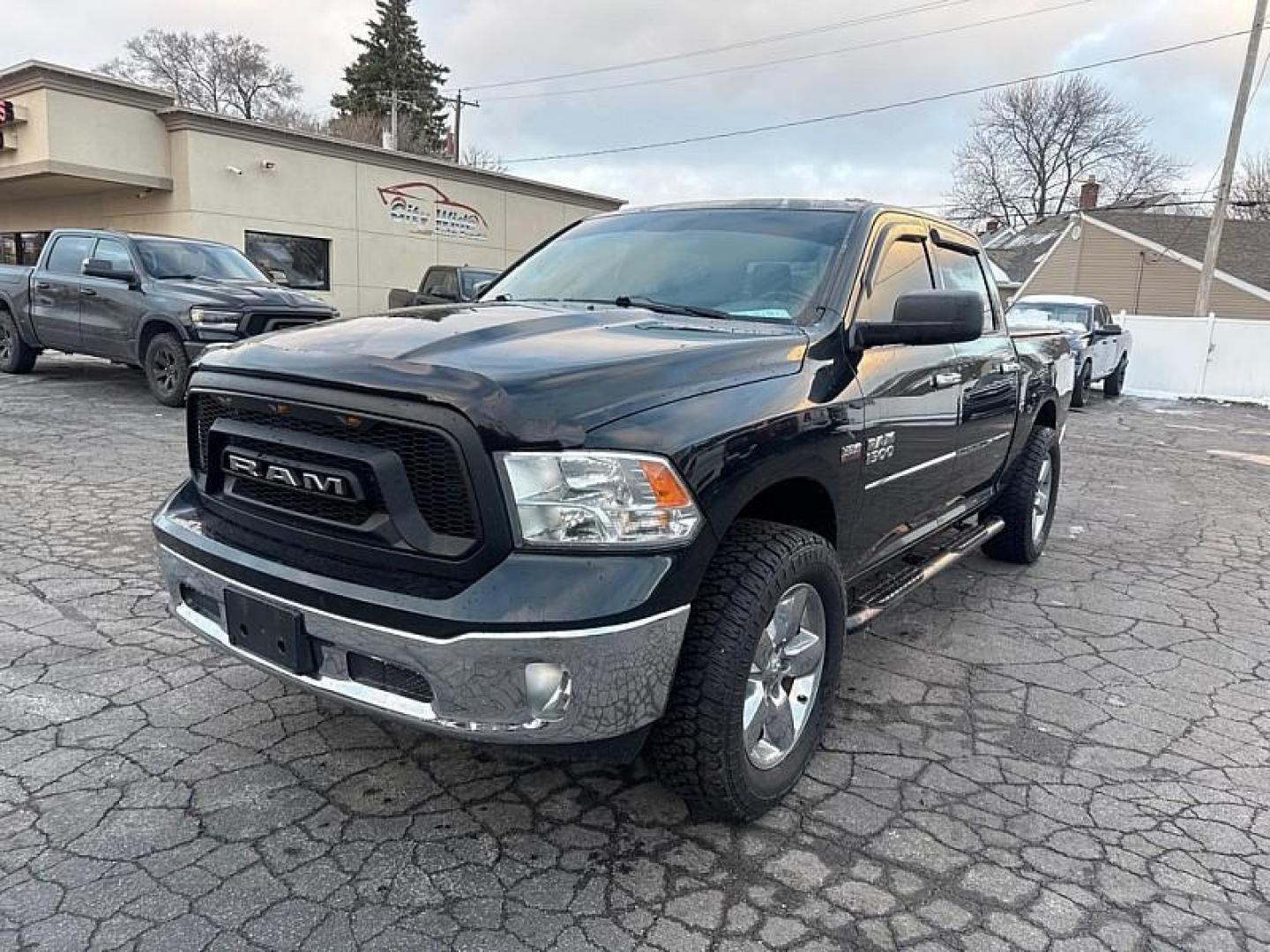 2015 GREEN /BLACK RAM 1500 SLT Crew Cab SWB 4WD (1C6RR7LT8FS) with an 5.7L V8 OHV 16V engine, 6-Speed Automatic transmission, located at 3304 Woodville Road, Northwood, OH, 43619, (419) 210-8019, 41.612694, -83.480743 - Your #1 Destination for Auto Loans and mdash;No Matter Your Credit!At our dealership, we believe everyone deserves the opportunity to drive their dream car and mdash;whether you have good credit, bad credit, or no credit at all. With a wide selection of hundreds of cars, trucks, and SUVs, you'll fin - Photo#0