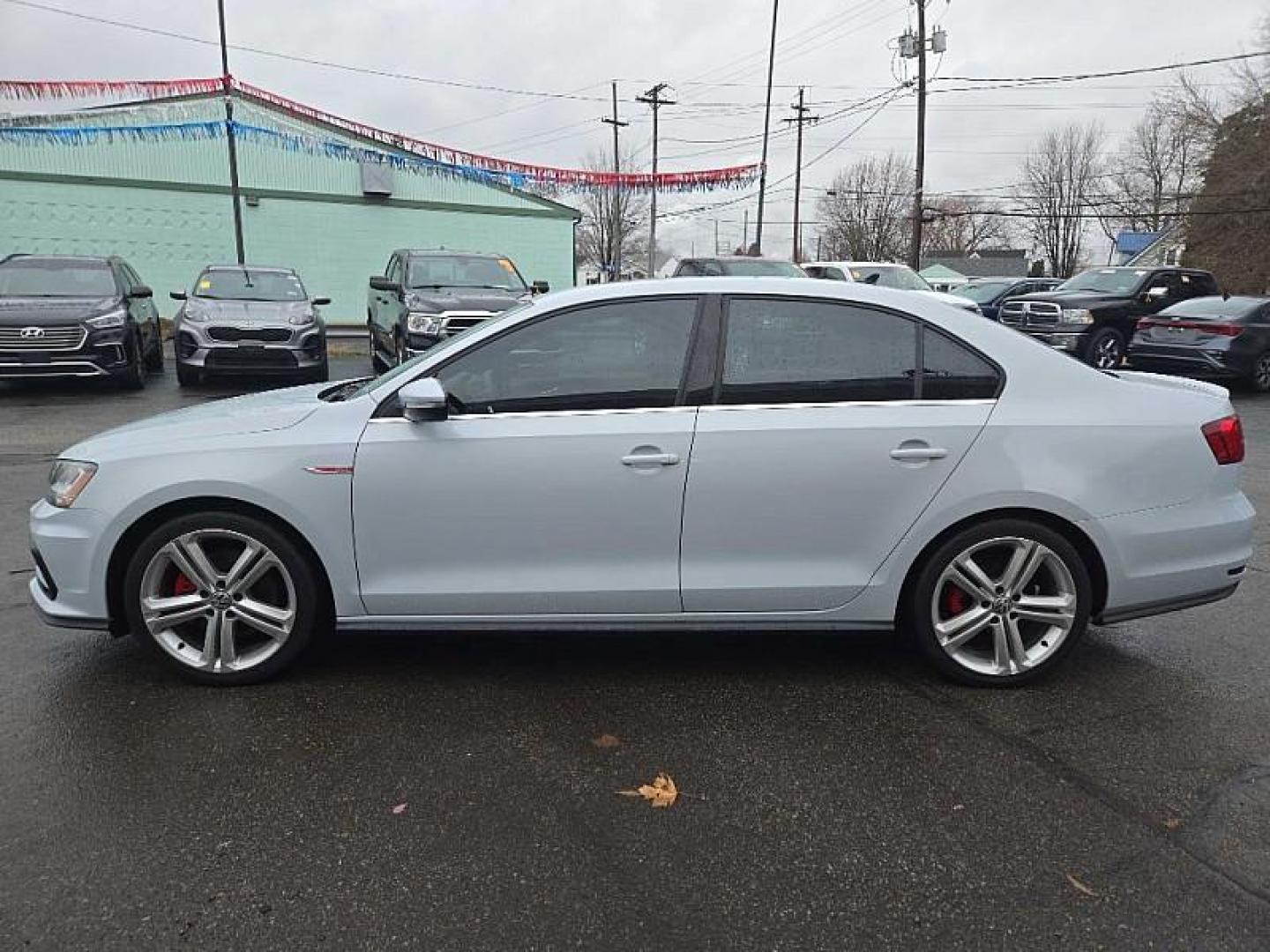 2017 WHITE /BLACK Volkswagen Jetta 2.0T GLI 6A (3VW4T7AJ9HM) with an 2.0L L4 DOHC 16V TURBO engine, 6A transmission, located at 3304 Woodville Road, Northwood, OH, 43619, (419) 210-8019, 41.612694, -83.480743 - Your #1 Destination for Auto Loans and mdash;No Matter Your Credit!At our dealership, we believe everyone deserves the opportunity to drive their dream car and mdash;whether you have good credit, bad credit, or no credit at all. With a wide selection of hundreds of cars, trucks, and SUVs, you'll fin - Photo#4