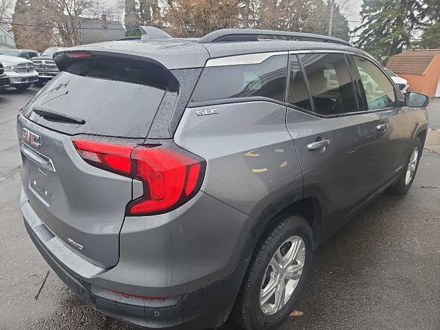 2019 GRAY /BLACK GMC Terrain SLE AWD (3GKALTEV3KL) with an 1.4L L4 DOHC 16V TURBO engine, 6A transmission, located at 3304 Woodville Road, Northwood, OH, 43619, (419) 210-8019, 41.612694, -83.480743 - Your #1 Destination for Auto Loans and mdash;No Matter Your Credit!At our dealership, we believe everyone deserves the opportunity to drive their dream car and mdash;whether you have good credit, bad credit, or no credit at all. With a wide selection of hundreds of cars, trucks, and SUVs, you'll fin - Photo#4