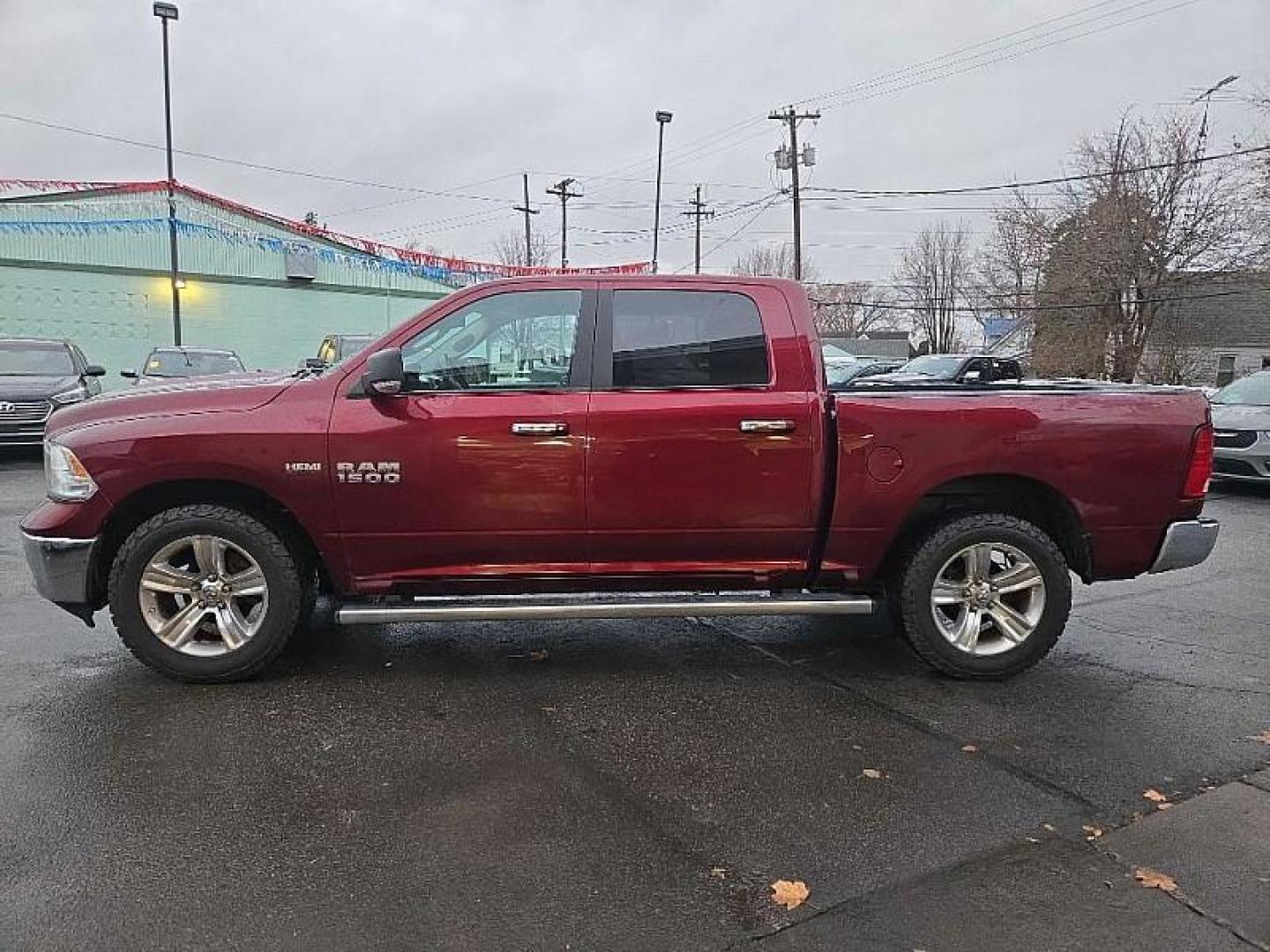 2017 RED /BLACK RAM 1500 SLT Crew Cab SWB 4WD (1C6RR7LT8HS) with an 5.7L V8 OHV 16V engine, 8A transmission, located at 3304 Woodville Road, Northwood, OH, 43619, (419) 210-8019, 41.612694, -83.480743 - Your #1 Destination for Auto Loans and mdash;No Matter Your Credit!At our dealership, we believe everyone deserves the opportunity to drive their dream car and mdash;whether you have good credit, bad credit, or no credit at all. With a wide selection of hundreds of cars, trucks, and SUVs, you'll fin - Photo#3