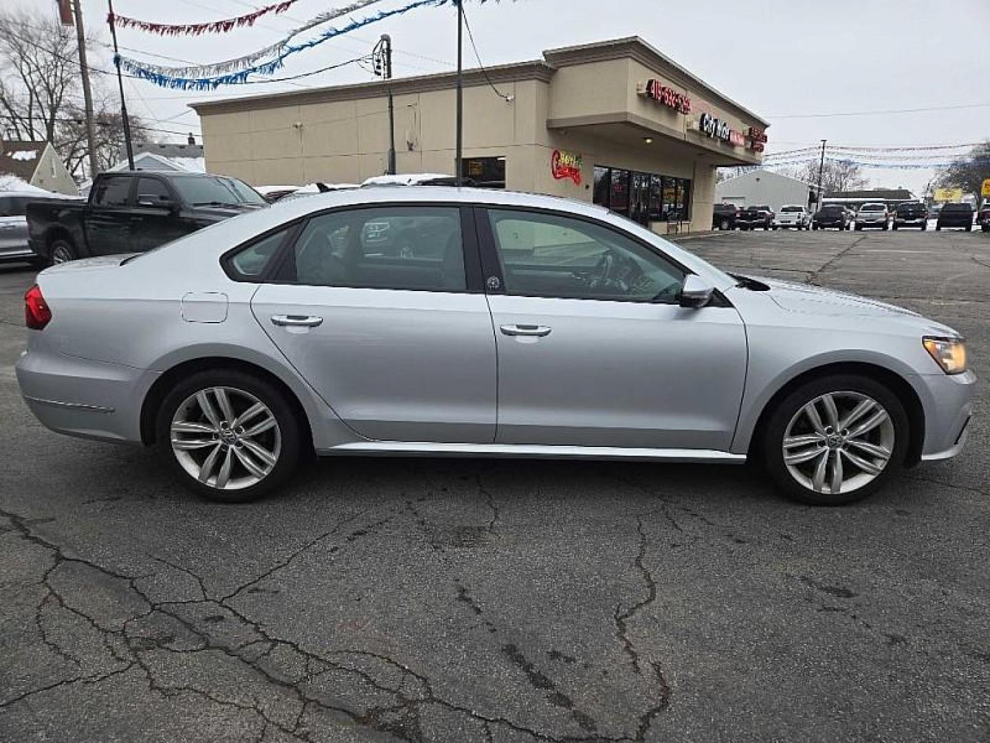 2019 SILVER /BLACK Volkswagen Passat Wolfsburg Edition (1VWLA7A34KC) with an 2.0L L4 DOHC 16V engine, 6A transmission, located at 3304 Woodville Road, Northwood, OH, 43619, (419) 210-8019, 41.612694, -83.480743 - Your #1 Destination for Auto Loans and mdash;No Matter Your Credit!At our dealership, we believe everyone deserves the opportunity to drive their dream car and mdash;whether you have good credit, bad credit, or no credit at all. With a wide selection of hundreds of cars, trucks, and SUVs, you'll fin - Photo#5