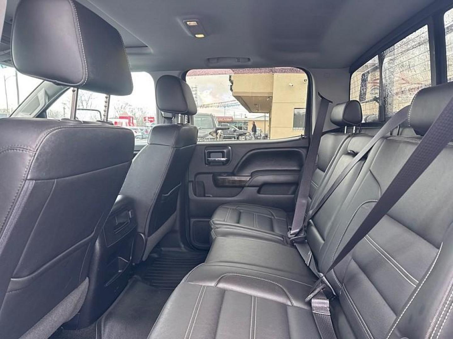 2016 WHITE GMC Sierra 2500HD Denali Crew Cab 4WD (1GT12UEG7GF) with an 6.0L V8 OHV 16V FFV engine, 6A transmission, located at 3304 Woodville Road, Northwood, OH, 43619, (419) 210-8019, 41.612694, -83.480743 - Photo#12