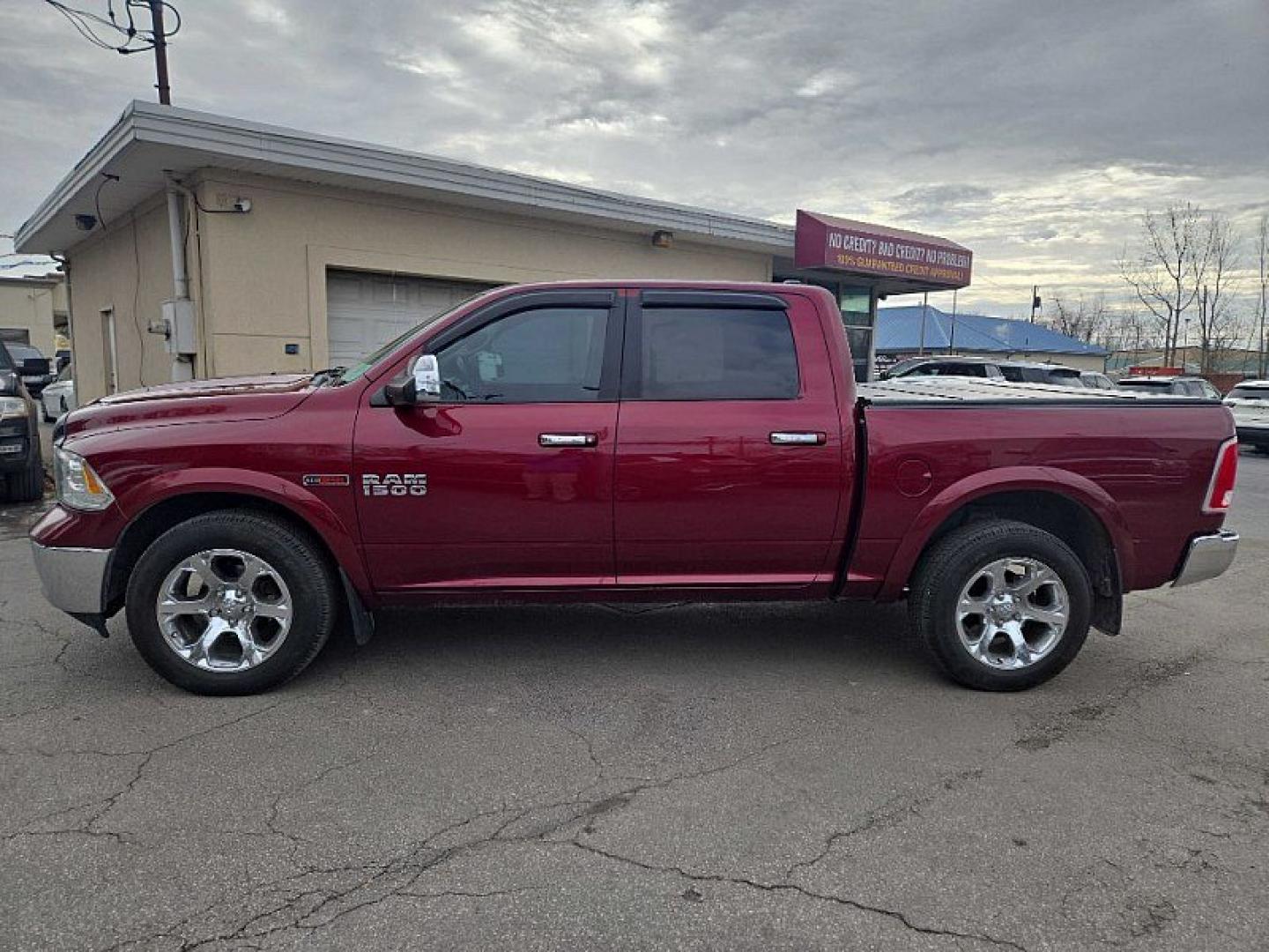 2017 RED /BLACK RAM 1500 Laramie Crew Cab SWB 4WD (1C6RR7NM1HS) with an 3.0L V6 DIESEL engine, 8A transmission, located at 3304 Woodville Road, Northwood, OH, 43619, (419) 210-8019, 41.612694, -83.480743 - Your #1 Destination for Auto Loans and mdash;No Matter Your Credit!At our dealership, we believe everyone deserves the opportunity to drive their dream car and mdash;whether you have good credit, bad credit, or no credit at all. With a wide selection of hundreds of cars, trucks, and SUVs, you'll fin - Photo#4
