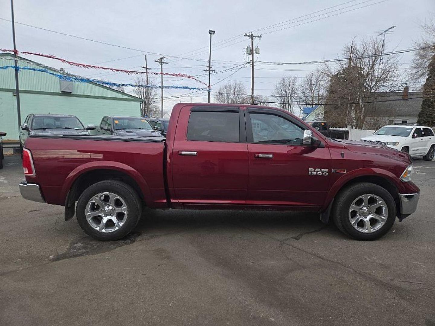 2017 RED /BLACK RAM 1500 Laramie Crew Cab SWB 4WD (1C6RR7NM1HS) with an 3.0L V6 DIESEL engine, 8A transmission, located at 3304 Woodville Road, Northwood, OH, 43619, (419) 210-8019, 41.612694, -83.480743 - Your #1 Destination for Auto Loans and mdash;No Matter Your Credit!At our dealership, we believe everyone deserves the opportunity to drive their dream car and mdash;whether you have good credit, bad credit, or no credit at all. With a wide selection of hundreds of cars, trucks, and SUVs, you'll fin - Photo#5