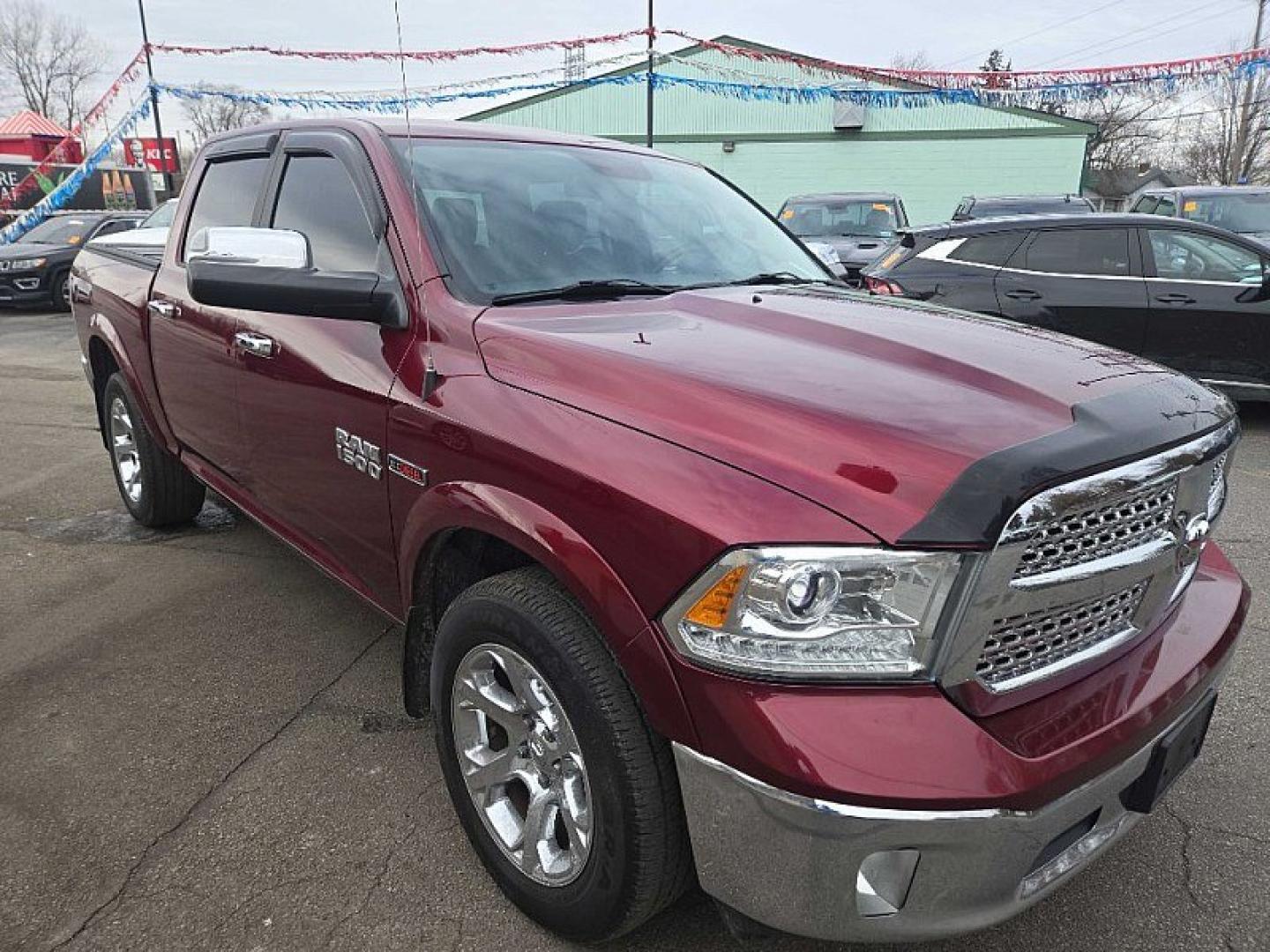 2017 RED /BLACK RAM 1500 Laramie Crew Cab SWB 4WD (1C6RR7NM1HS) with an 3.0L V6 DIESEL engine, 8A transmission, located at 3304 Woodville Road, Northwood, OH, 43619, (419) 210-8019, 41.612694, -83.480743 - Your #1 Destination for Auto Loans and mdash;No Matter Your Credit!At our dealership, we believe everyone deserves the opportunity to drive their dream car and mdash;whether you have good credit, bad credit, or no credit at all. With a wide selection of hundreds of cars, trucks, and SUVs, you'll fin - Photo#6