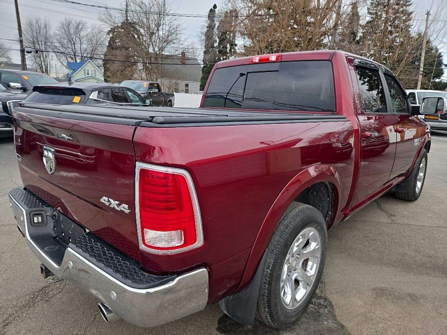 2017 RED /BLACK RAM 1500 Laramie Crew Cab SWB 4WD (1C6RR7NM1HS) with an 3.0L V6 DIESEL engine, 8A transmission, located at 3304 Woodville Road, Northwood, OH, 43619, (419) 210-8019, 41.612694, -83.480743 - Your #1 Destination for Auto Loans and mdash;No Matter Your Credit!At our dealership, we believe everyone deserves the opportunity to drive their dream car and mdash;whether you have good credit, bad credit, or no credit at all. With a wide selection of hundreds of cars, trucks, and SUVs, you'll fin - Photo#1