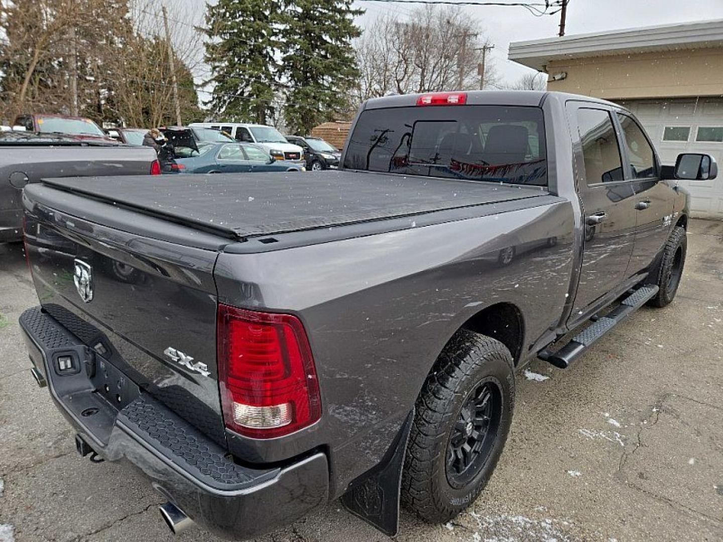 2014 GRAY RAM 1500 Sport Crew Cab LWB 4WD (1C6RR7UT2ES) with an 5.7L V8 OHV 16V engine, 6-Speed Automatic transmission, located at 3304 Woodville Road, Northwood, OH, 43619, (419) 210-8019, 41.612694, -83.480743 - Your #1 Destination for Auto Loans and mdash;No Matter Your Credit!At our dealership, we believe everyone deserves the opportunity to drive their dream car and mdash;whether you have good credit, bad credit, or no credit at all. With a wide selection of hundreds of cars, trucks, and SUVs, you'll fin - Photo#4