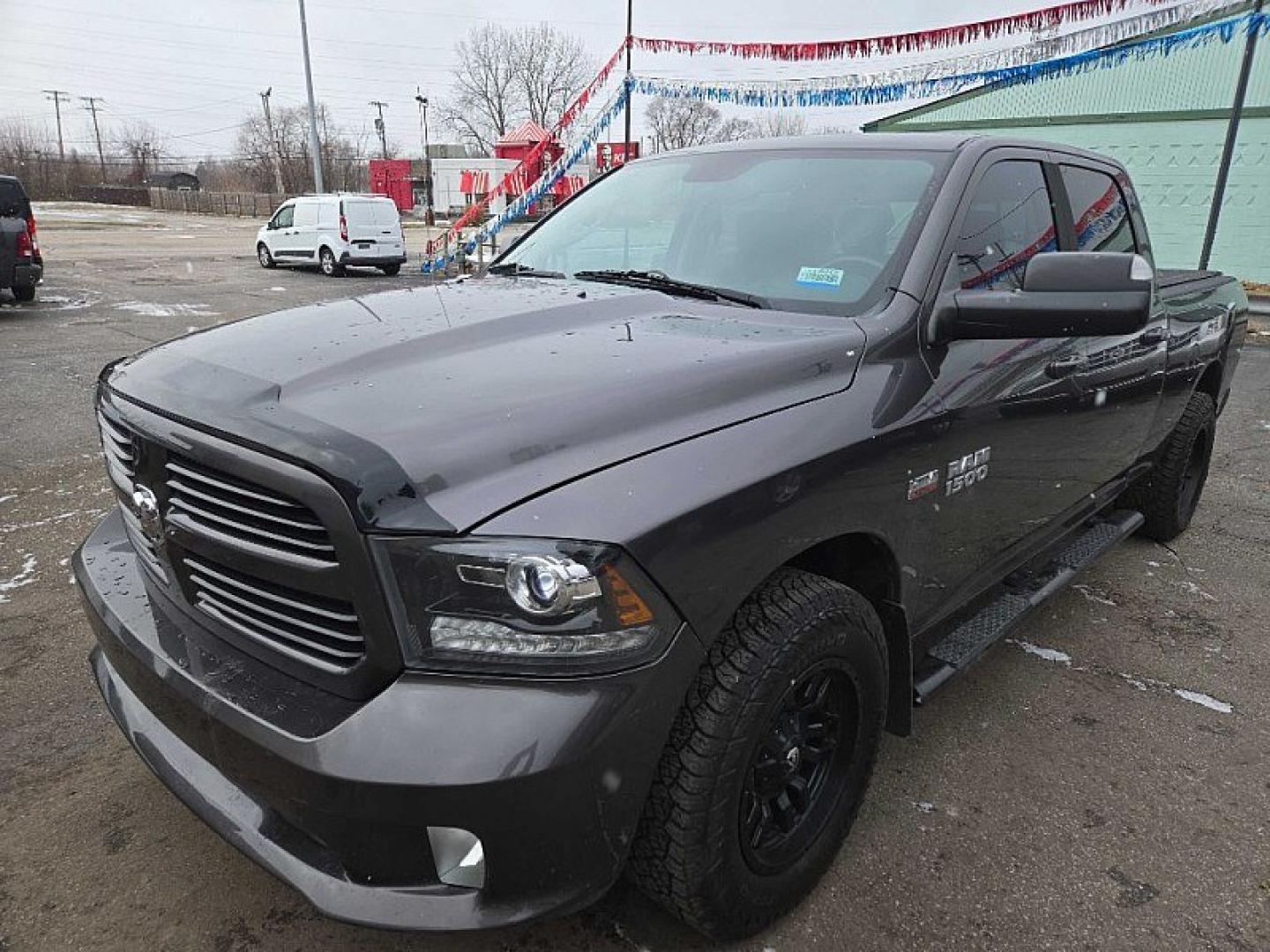 2014 GRAY RAM 1500 Sport Crew Cab LWB 4WD (1C6RR7UT2ES) with an 5.7L V8 OHV 16V engine, 6-Speed Automatic transmission, located at 3304 Woodville Road, Northwood, OH, 43619, (419) 210-8019, 41.612694, -83.480743 - Your #1 Destination for Auto Loans and mdash;No Matter Your Credit!At our dealership, we believe everyone deserves the opportunity to drive their dream car and mdash;whether you have good credit, bad credit, or no credit at all. With a wide selection of hundreds of cars, trucks, and SUVs, you'll fin - Photo#0
