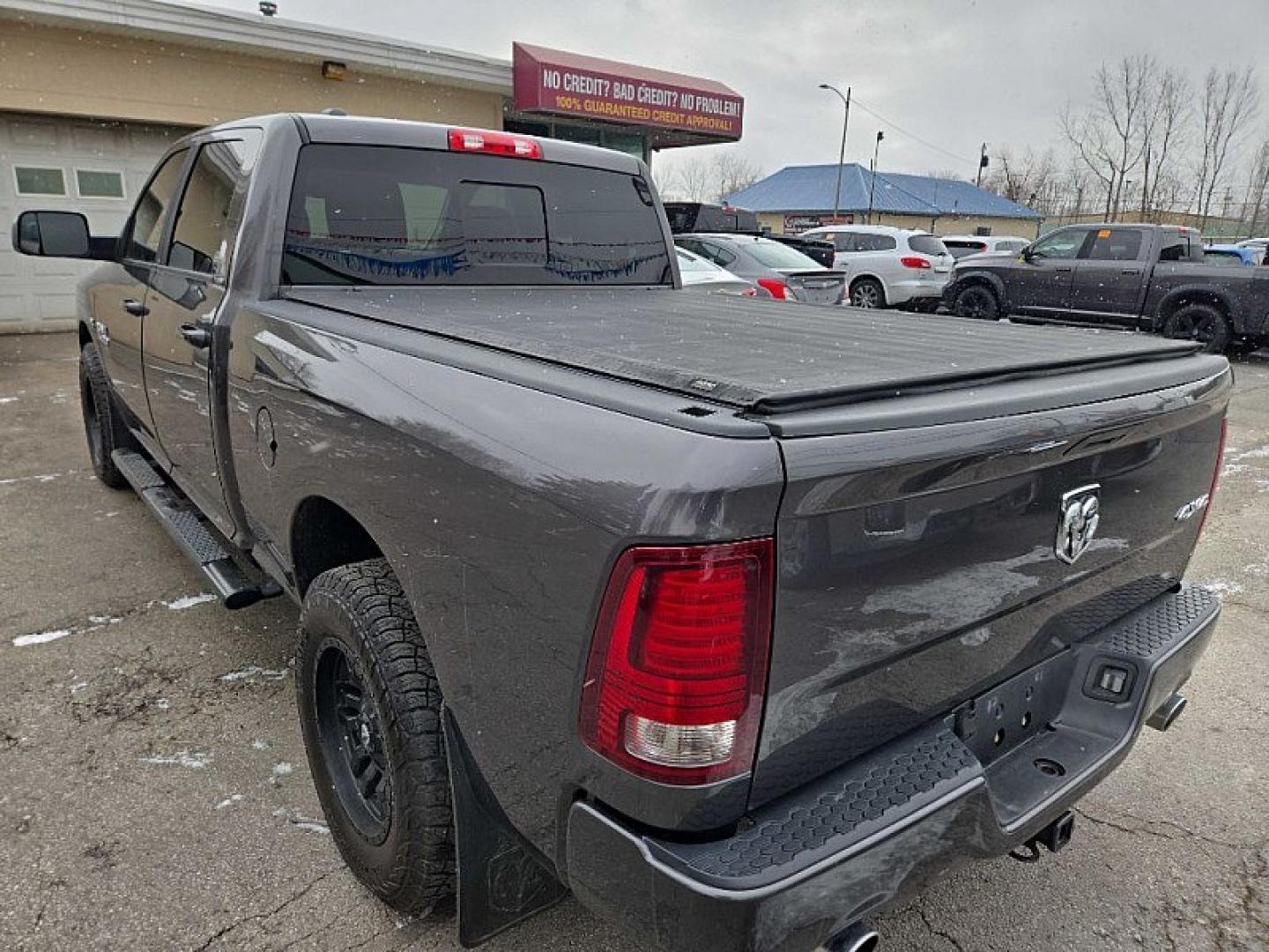 2014 GRAY RAM 1500 Sport Crew Cab LWB 4WD (1C6RR7UT2ES) with an 5.7L V8 OHV 16V engine, 6-Speed Automatic transmission, located at 3304 Woodville Road, Northwood, OH, 43619, (419) 210-8019, 41.612694, -83.480743 - Your #1 Destination for Auto Loans and mdash;No Matter Your Credit!At our dealership, we believe everyone deserves the opportunity to drive their dream car and mdash;whether you have good credit, bad credit, or no credit at all. With a wide selection of hundreds of cars, trucks, and SUVs, you'll fin - Photo#2
