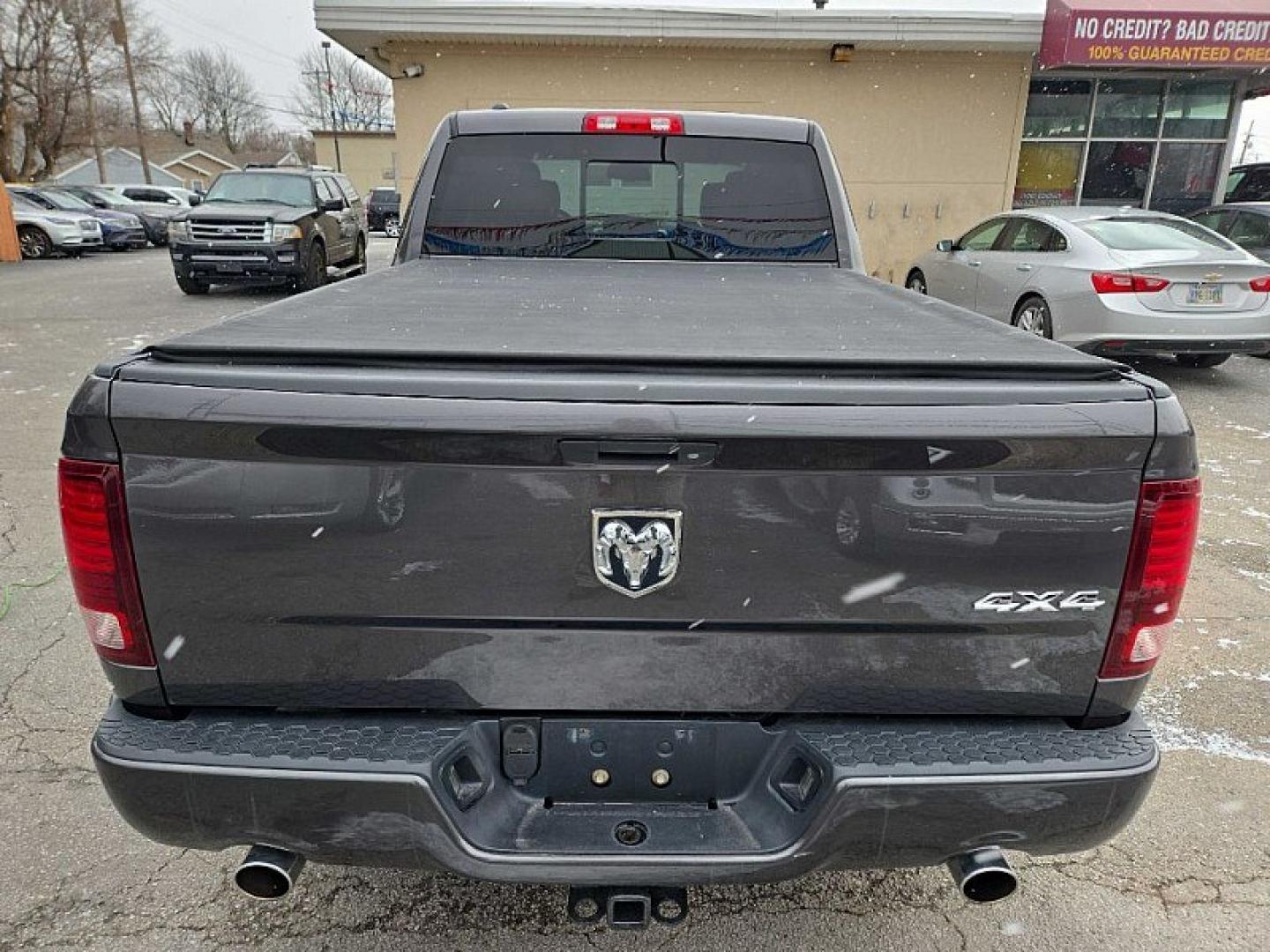 2014 GRAY RAM 1500 Sport Crew Cab LWB 4WD (1C6RR7UT2ES) with an 5.7L V8 OHV 16V engine, 6-Speed Automatic transmission, located at 3304 Woodville Road, Northwood, OH, 43619, (419) 210-8019, 41.612694, -83.480743 - Your #1 Destination for Auto Loans and mdash;No Matter Your Credit!At our dealership, we believe everyone deserves the opportunity to drive their dream car and mdash;whether you have good credit, bad credit, or no credit at all. With a wide selection of hundreds of cars, trucks, and SUVs, you'll fin - Photo#3