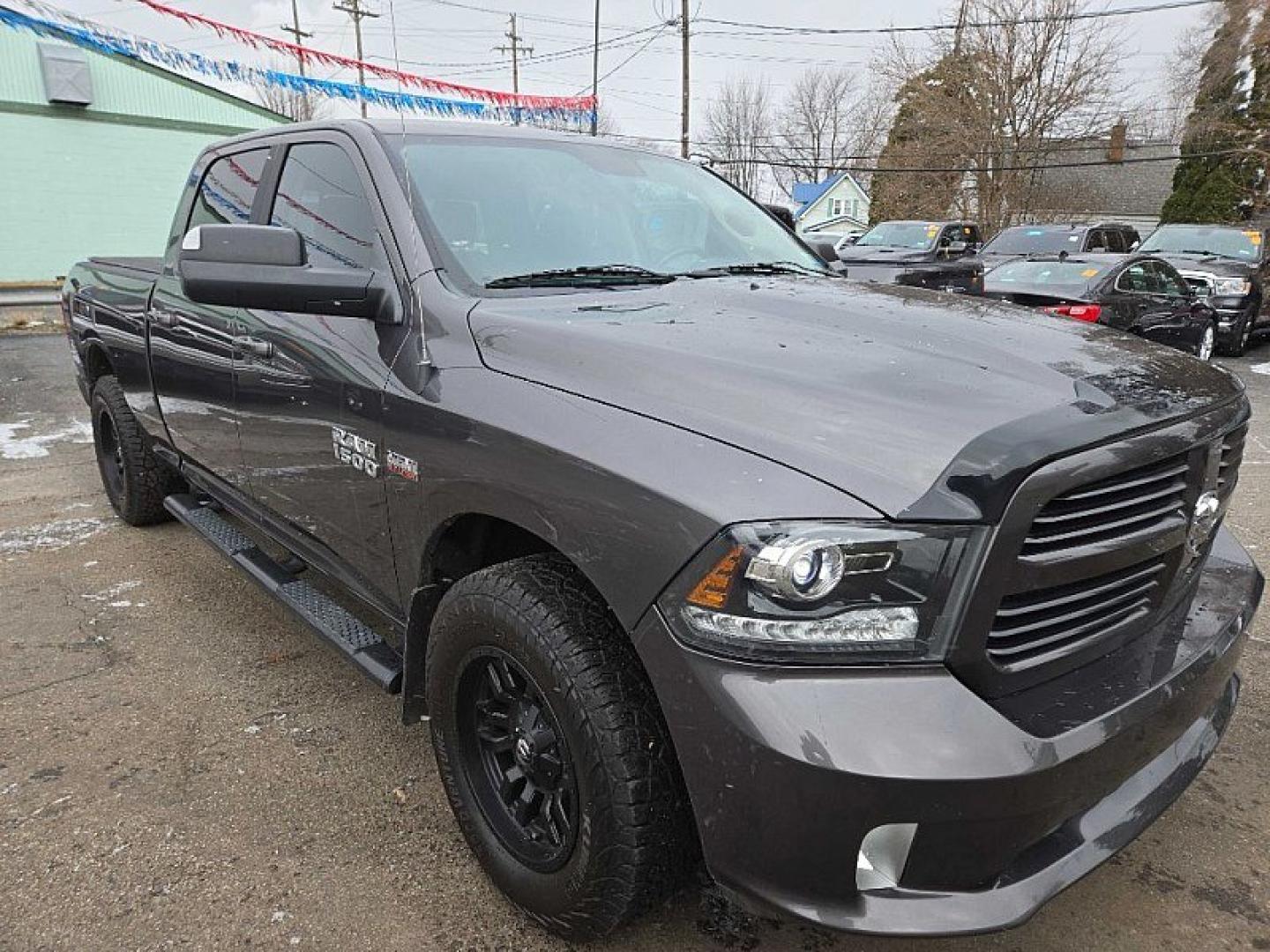 2014 GRAY RAM 1500 Sport Crew Cab LWB 4WD (1C6RR7UT2ES) with an 5.7L V8 OHV 16V engine, 6-Speed Automatic transmission, located at 3304 Woodville Road, Northwood, OH, 43619, (419) 210-8019, 41.612694, -83.480743 - Your #1 Destination for Auto Loans and mdash;No Matter Your Credit!At our dealership, we believe everyone deserves the opportunity to drive their dream car and mdash;whether you have good credit, bad credit, or no credit at all. With a wide selection of hundreds of cars, trucks, and SUVs, you'll fin - Photo#6
