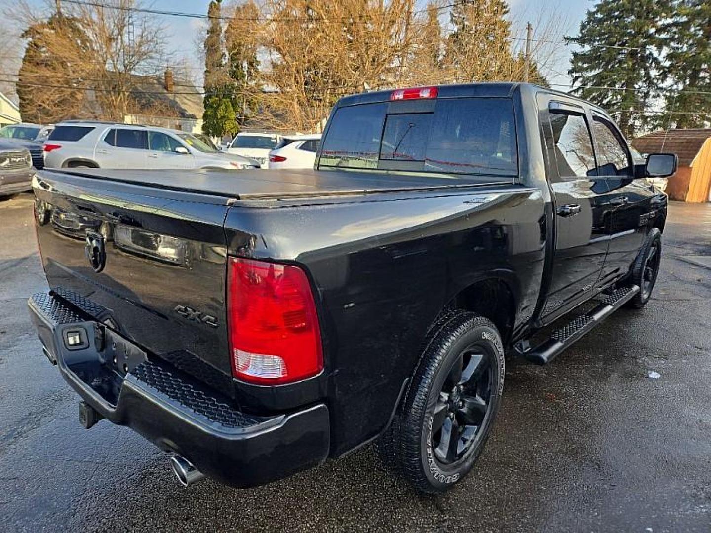 2018 BLACK /BLACK RAM 1500 SLT Crew Cab SWB 4WD (1C6RR7LM3JS) with an 3.0L V6 DIESEL engine, 8A transmission, located at 3304 Woodville Road, Northwood, OH, 43619, (419) 210-8019, 41.612694, -83.480743 - Your #1 Destination for Auto Loans and mdash;No Matter Your Credit!At our dealership, we believe everyone deserves the opportunity to drive their dream car and mdash;whether you have good credit, bad credit, or no credit at all. With a wide selection of hundreds of cars, trucks, and SUVs, you'll fin - Photo#4