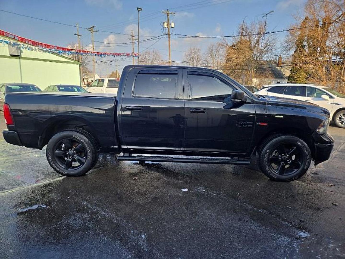 2018 BLACK /BLACK RAM 1500 SLT Crew Cab SWB 4WD (1C6RR7LM3JS) with an 3.0L V6 DIESEL engine, 8A transmission, located at 3304 Woodville Road, Northwood, OH, 43619, (419) 210-8019, 41.612694, -83.480743 - Your #1 Destination for Auto Loans and mdash;No Matter Your Credit!At our dealership, we believe everyone deserves the opportunity to drive their dream car and mdash;whether you have good credit, bad credit, or no credit at all. With a wide selection of hundreds of cars, trucks, and SUVs, you'll fin - Photo#5