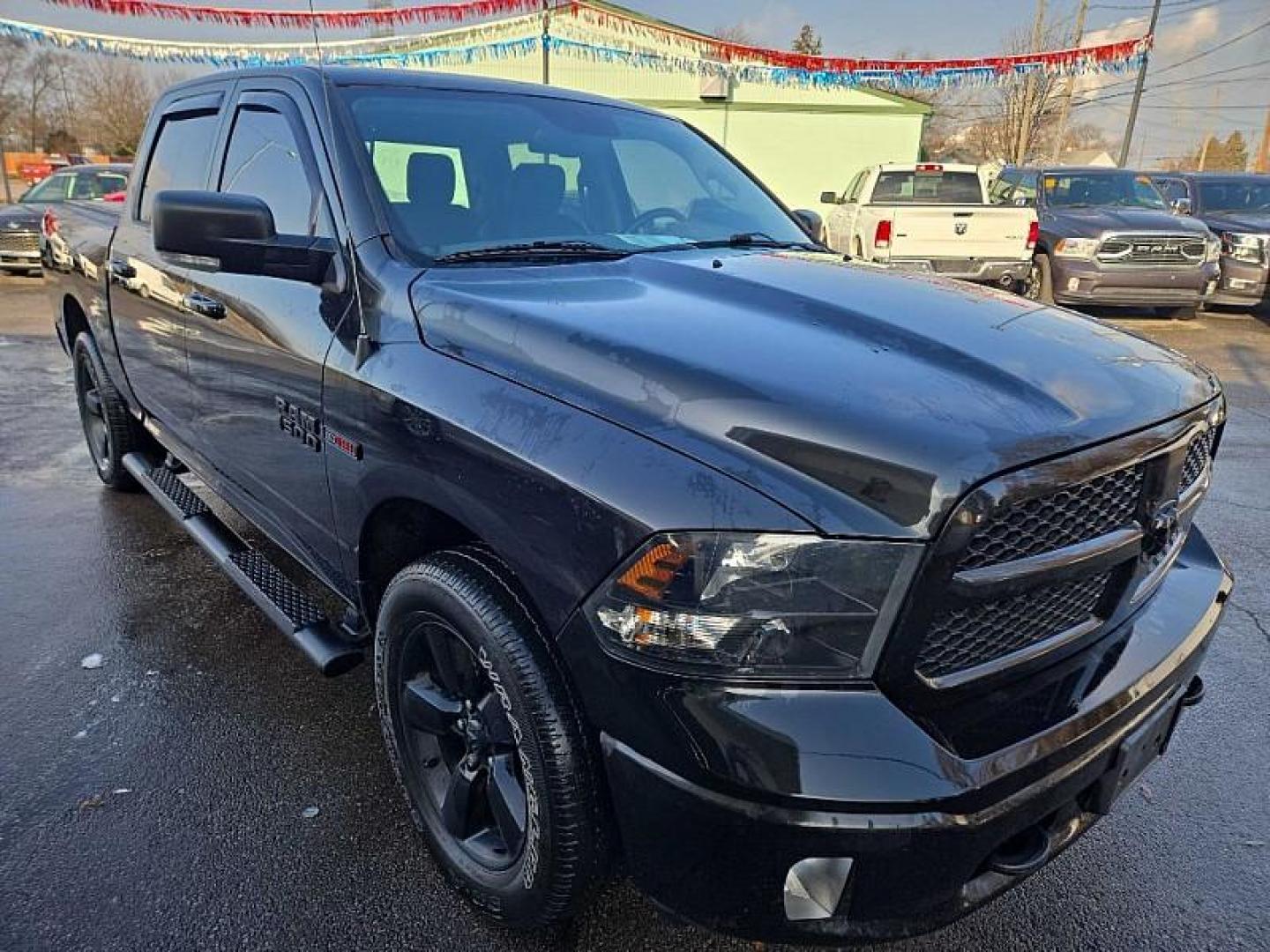 2018 BLACK /BLACK RAM 1500 SLT Crew Cab SWB 4WD (1C6RR7LM3JS) with an 3.0L V6 DIESEL engine, 8A transmission, located at 3304 Woodville Road, Northwood, OH, 43619, (419) 210-8019, 41.612694, -83.480743 - Your #1 Destination for Auto Loans and mdash;No Matter Your Credit!At our dealership, we believe everyone deserves the opportunity to drive their dream car and mdash;whether you have good credit, bad credit, or no credit at all. With a wide selection of hundreds of cars, trucks, and SUVs, you'll fin - Photo#6