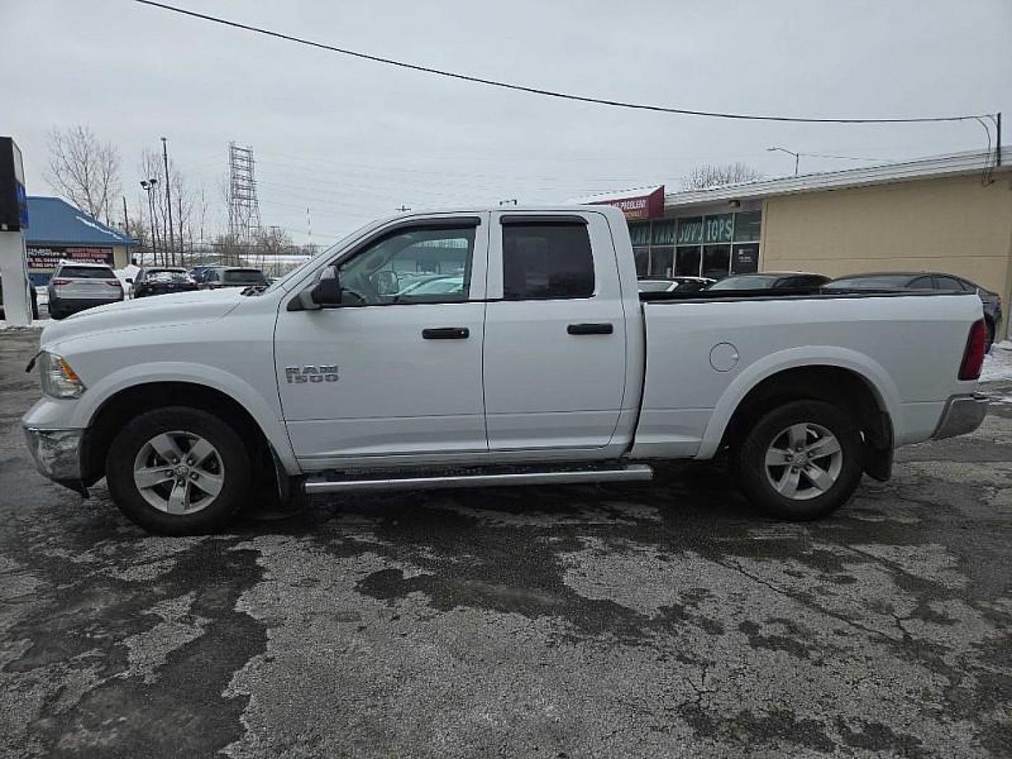 2016 WHITE RAM 1500 Tradesman Quad Cab 4WD (1C6RR7FG8GS) with an 3.6L V6 DOHC 24V FFV engine, 6A transmission, located at 3304 Woodville Road, Northwood, OH, 43619, (419) 210-8019, 41.612694, -83.480743 - Your #1 Destination for Auto Loans and mdash;No Matter Your Credit!At our dealership, we believe everyone deserves the opportunity to drive their dream car and mdash;whether you have good credit, bad credit, or no credit at all. With a wide selection of hundreds of cars, trucks, and SUVs, you'll fin - Photo#1