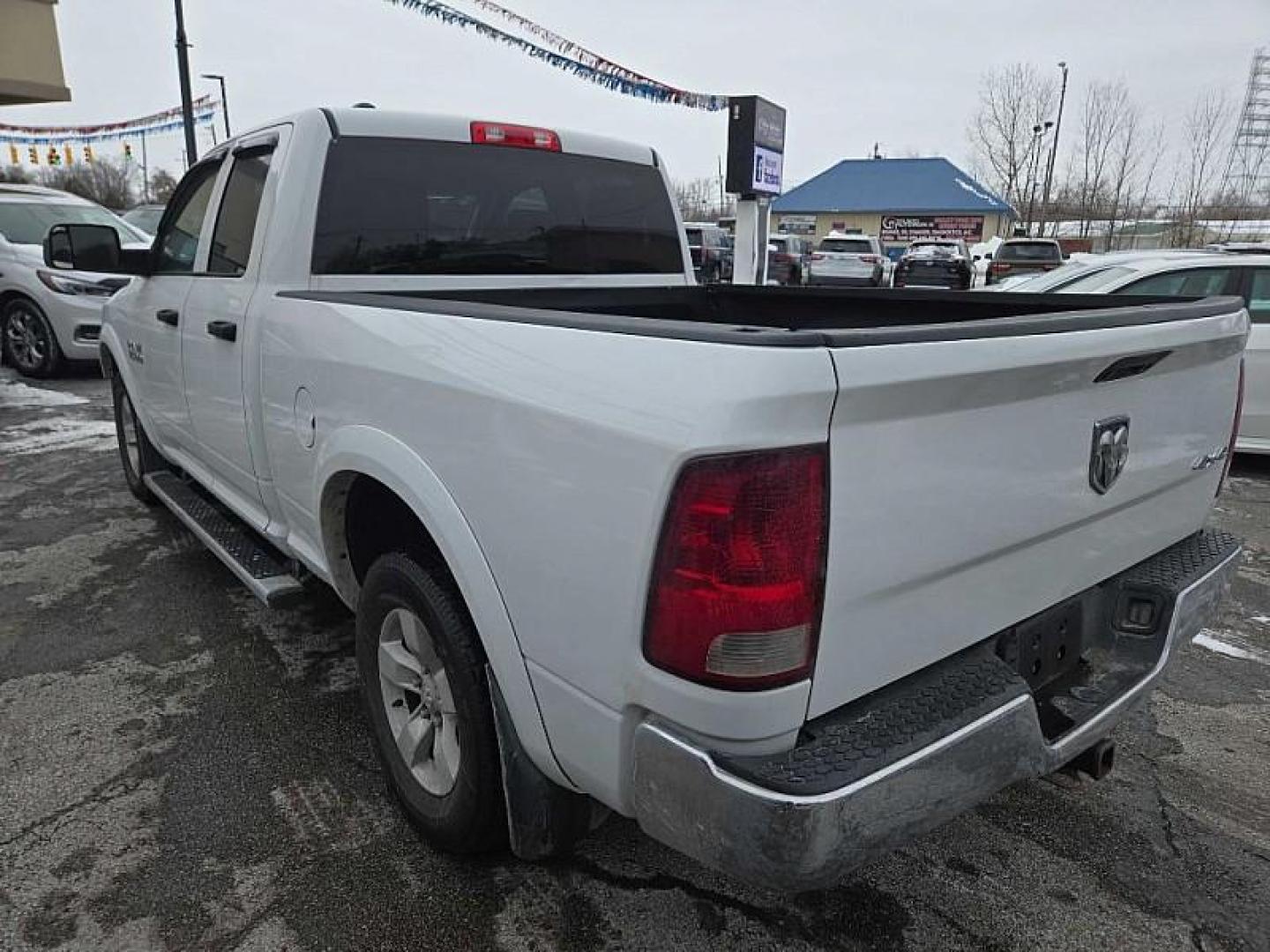 2016 WHITE RAM 1500 Tradesman Quad Cab 4WD (1C6RR7FG8GS) with an 3.6L V6 DOHC 24V FFV engine, 6A transmission, located at 3304 Woodville Road, Northwood, OH, 43619, (419) 210-8019, 41.612694, -83.480743 - Your #1 Destination for Auto Loans and mdash;No Matter Your Credit!At our dealership, we believe everyone deserves the opportunity to drive their dream car and mdash;whether you have good credit, bad credit, or no credit at all. With a wide selection of hundreds of cars, trucks, and SUVs, you'll fin - Photo#2