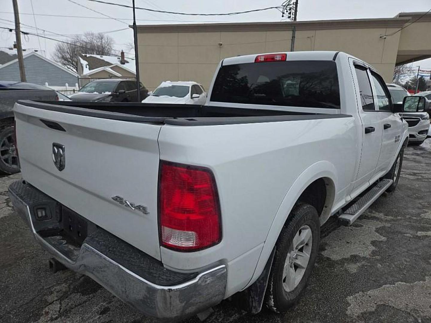 2016 WHITE RAM 1500 Tradesman Quad Cab 4WD (1C6RR7FG8GS) with an 3.6L V6 DOHC 24V FFV engine, 6A transmission, located at 3304 Woodville Road, Northwood, OH, 43619, (419) 210-8019, 41.612694, -83.480743 - Your #1 Destination for Auto Loans and mdash;No Matter Your Credit!At our dealership, we believe everyone deserves the opportunity to drive their dream car and mdash;whether you have good credit, bad credit, or no credit at all. With a wide selection of hundreds of cars, trucks, and SUVs, you'll fin - Photo#4
